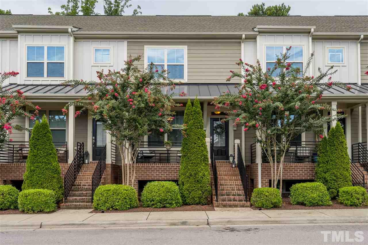 1547 Crafton Way Raleigh, NC 27607 - Photo 1 of 27 a front view of a house with garden