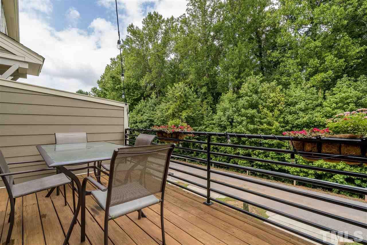 1547 Crafton Way Raleigh, NC 27607 - Photo 16 of 27 a view of a bench in a balcony