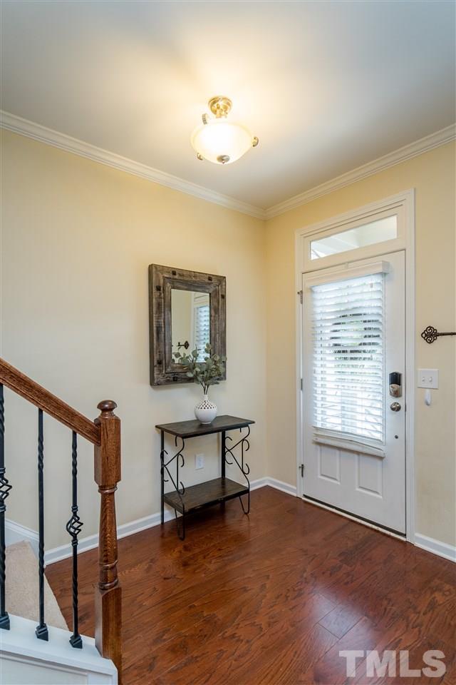 1547 Crafton Way Raleigh, NC 27607 - Photo 4 of 27 a view of a livingroom with furniture and a window