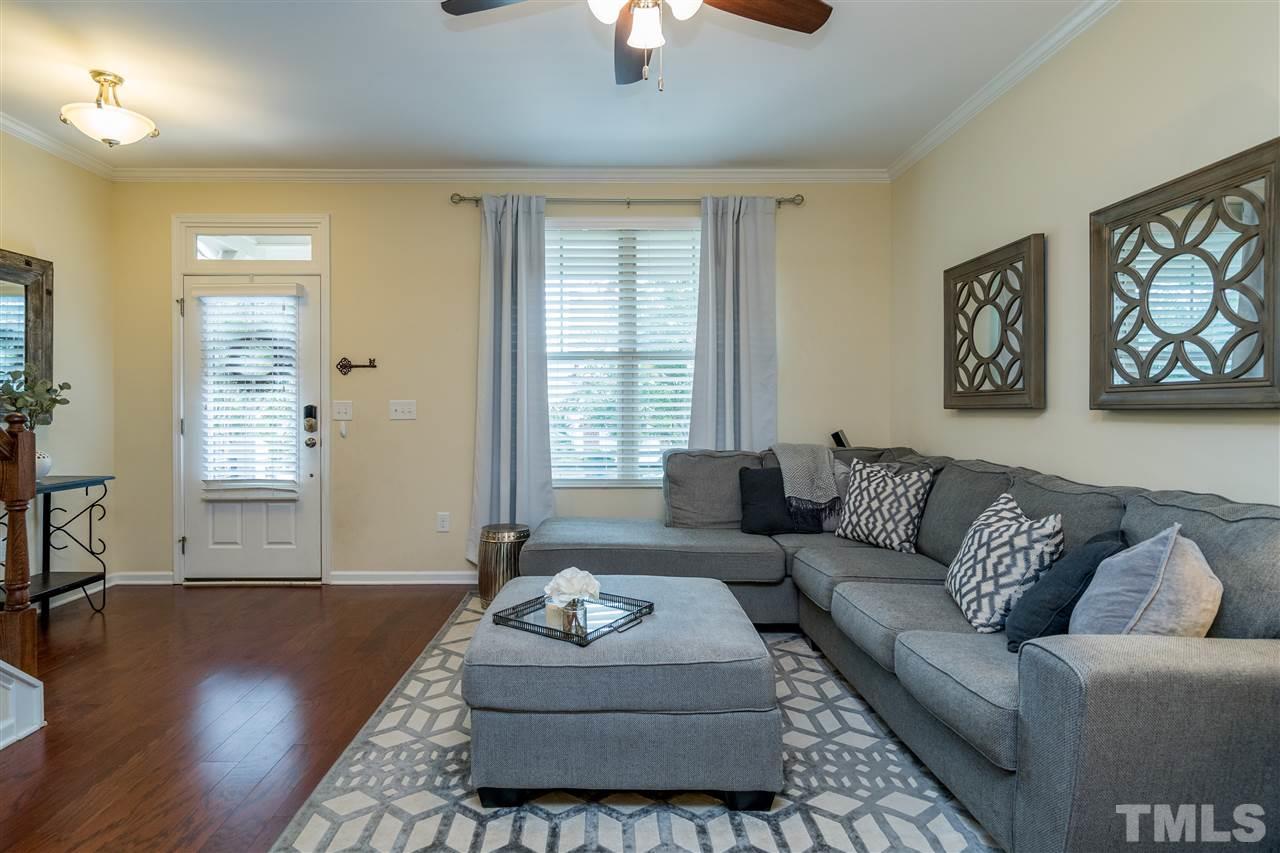 1547 Crafton Way Raleigh, NC 27607 - Photo 6 of 27 a living room with furniture and a window