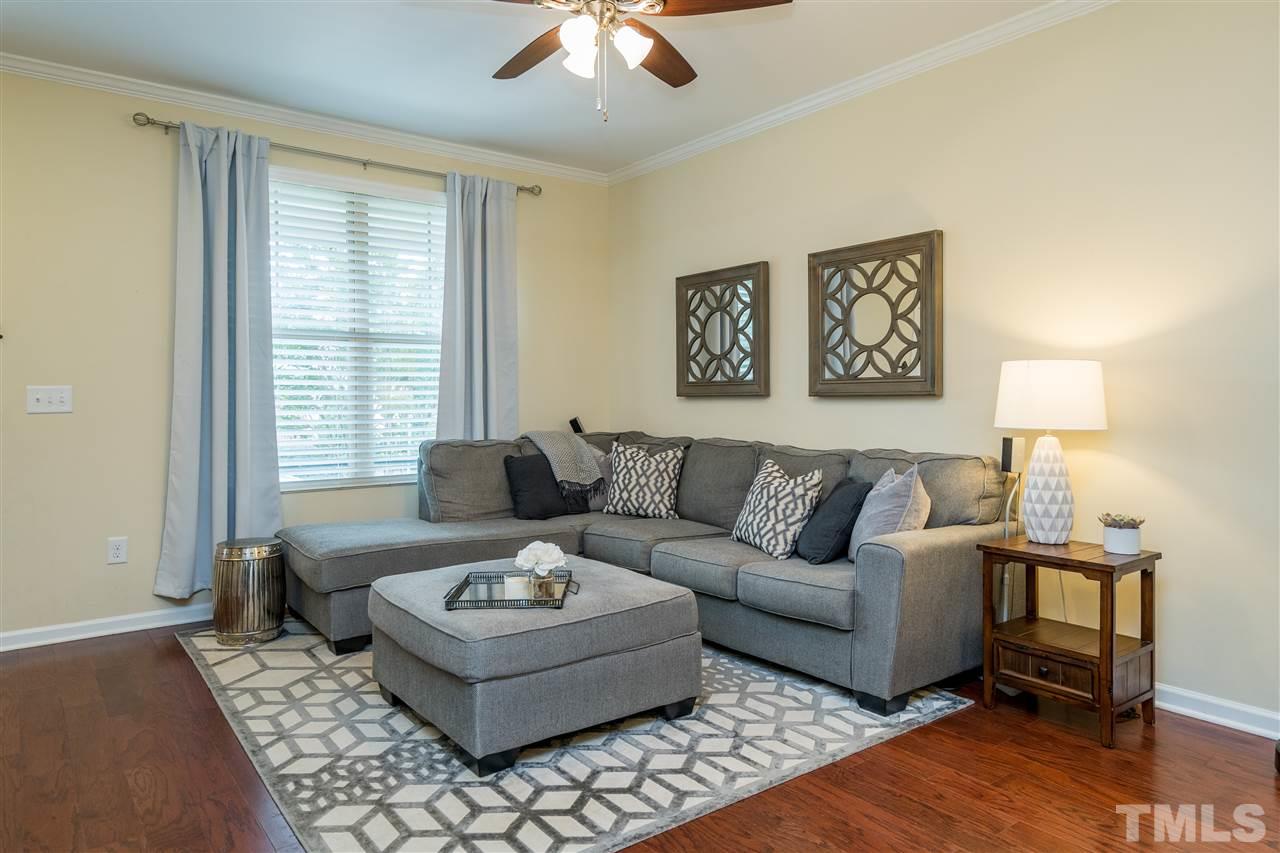 1547 Crafton Way Raleigh, NC 27607 - Photo 7 of 27 a living room with furniture and a window