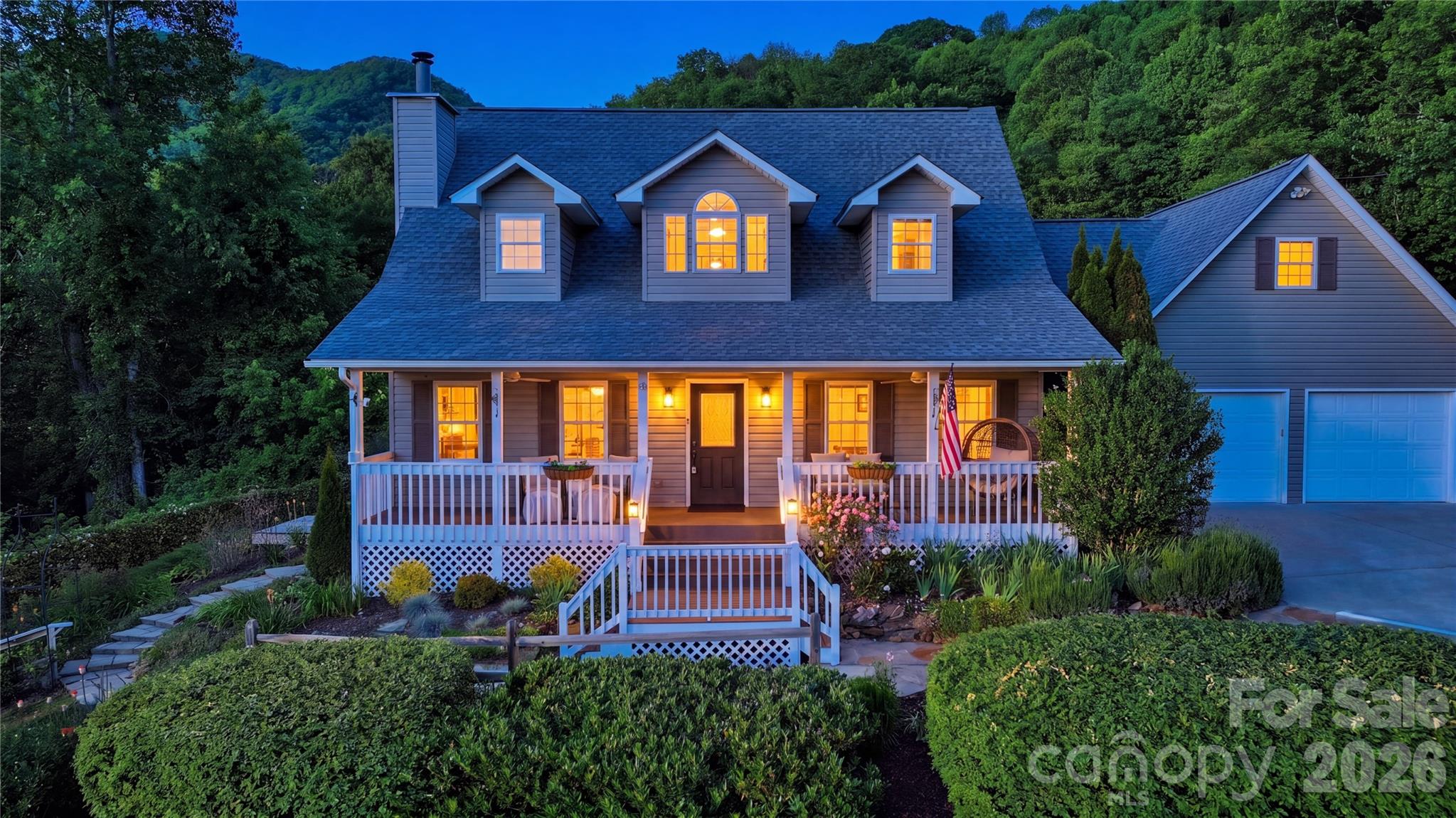 15 Raccoon Point Canton, NC 28716 - Photo 2 of 48 a front view of a house with a yard