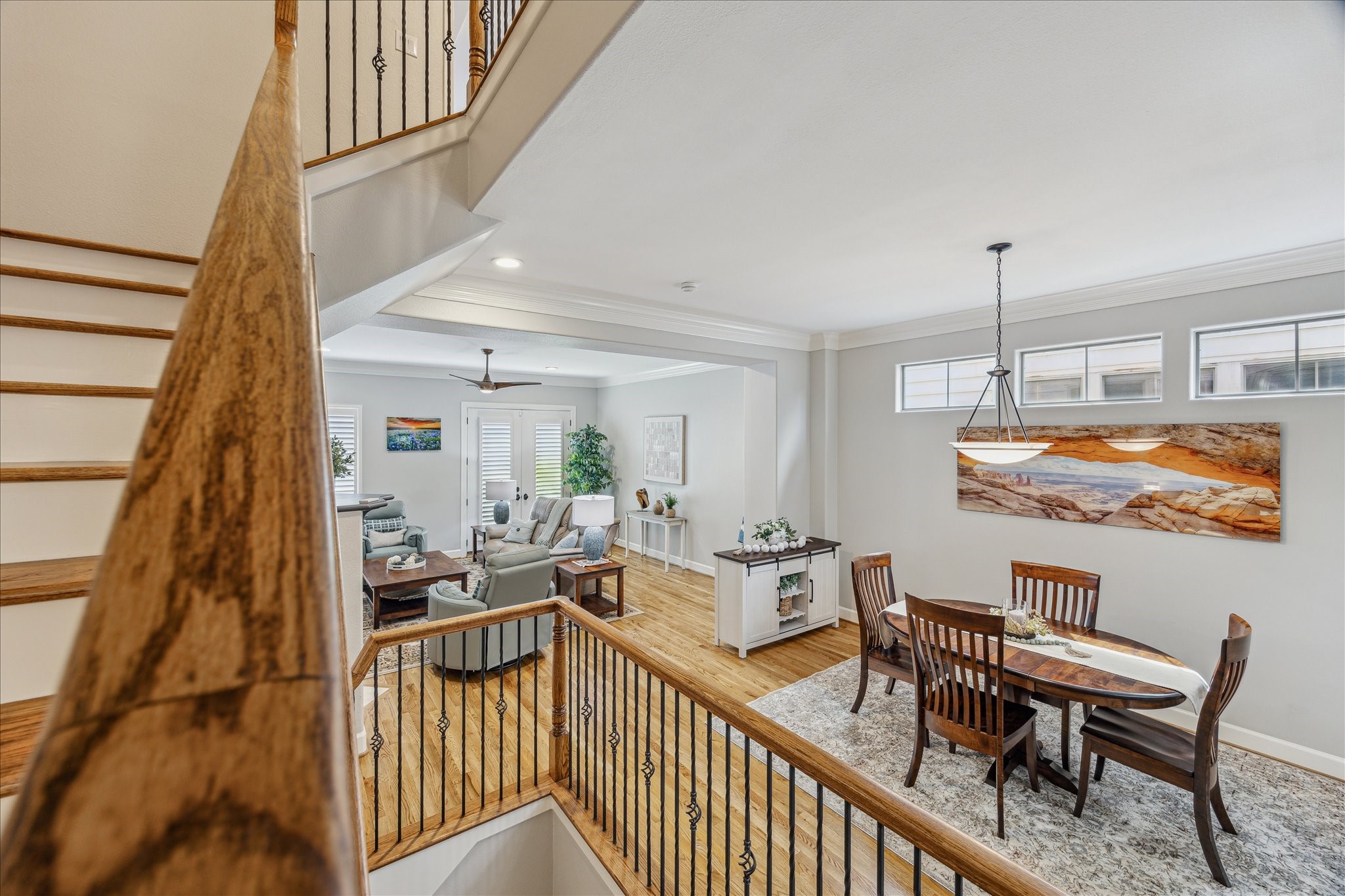 544 Bomar Street Houston, TX 77006 - Photo 28 of 43 STAIRWAY... The home’s elegant staircase, with wood treads, wrought iron balusters, and a wood handrail, adds architectural charm and sophistication.
