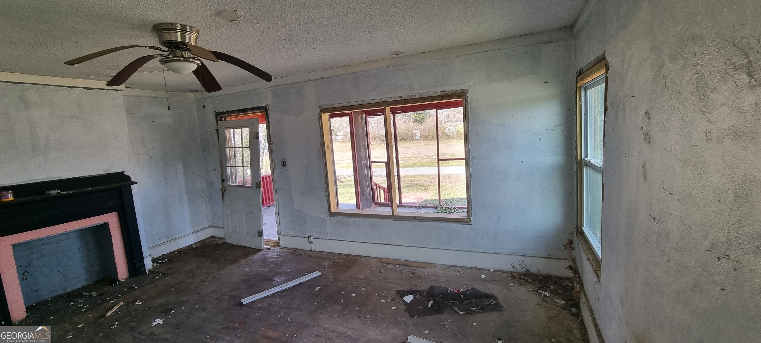 19 Landers Street Newnan, GA 30263 - Photo 17 of 40 wooden floor in an empty room with a window