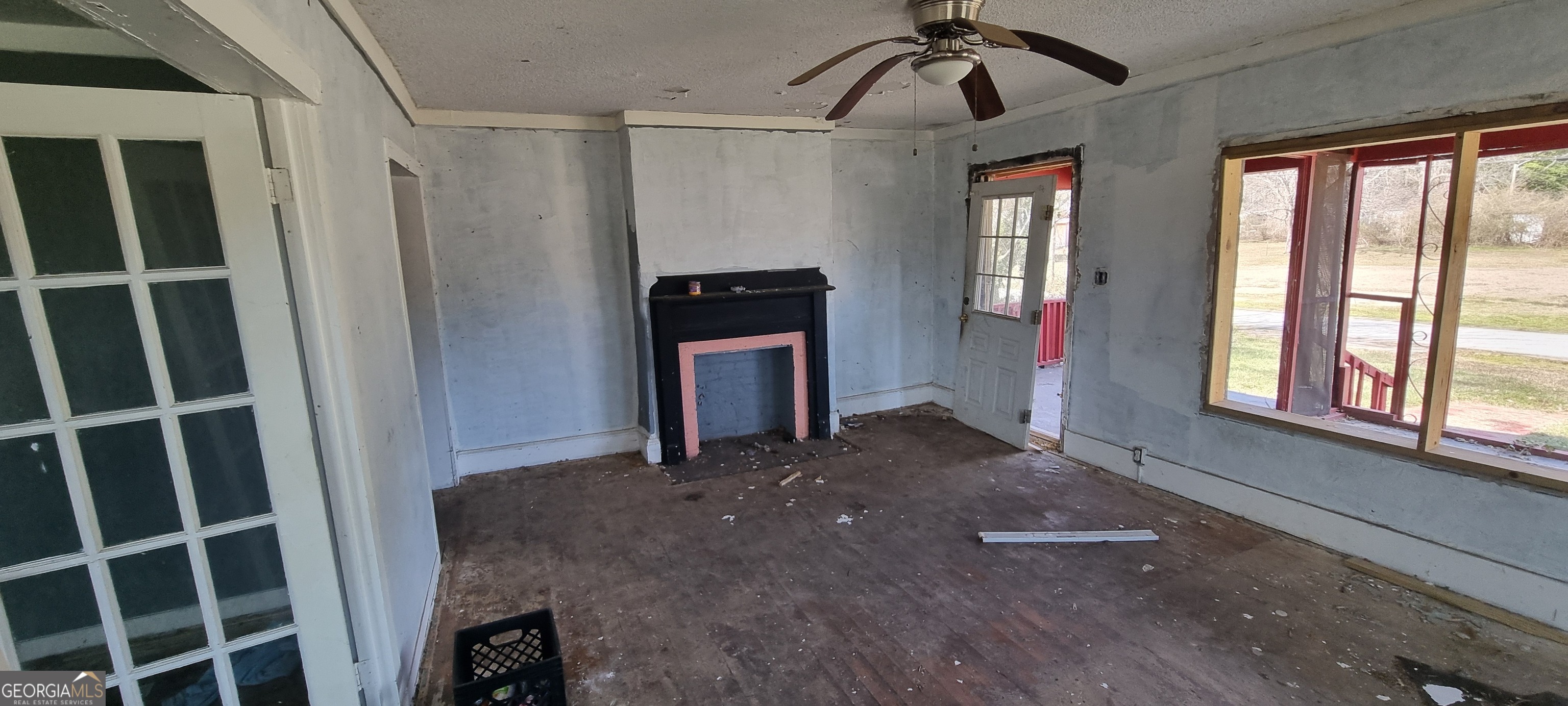 19 Landers Street Newnan, GA 30263 - Photo 18 of 40 a view of empty room with windows and fan