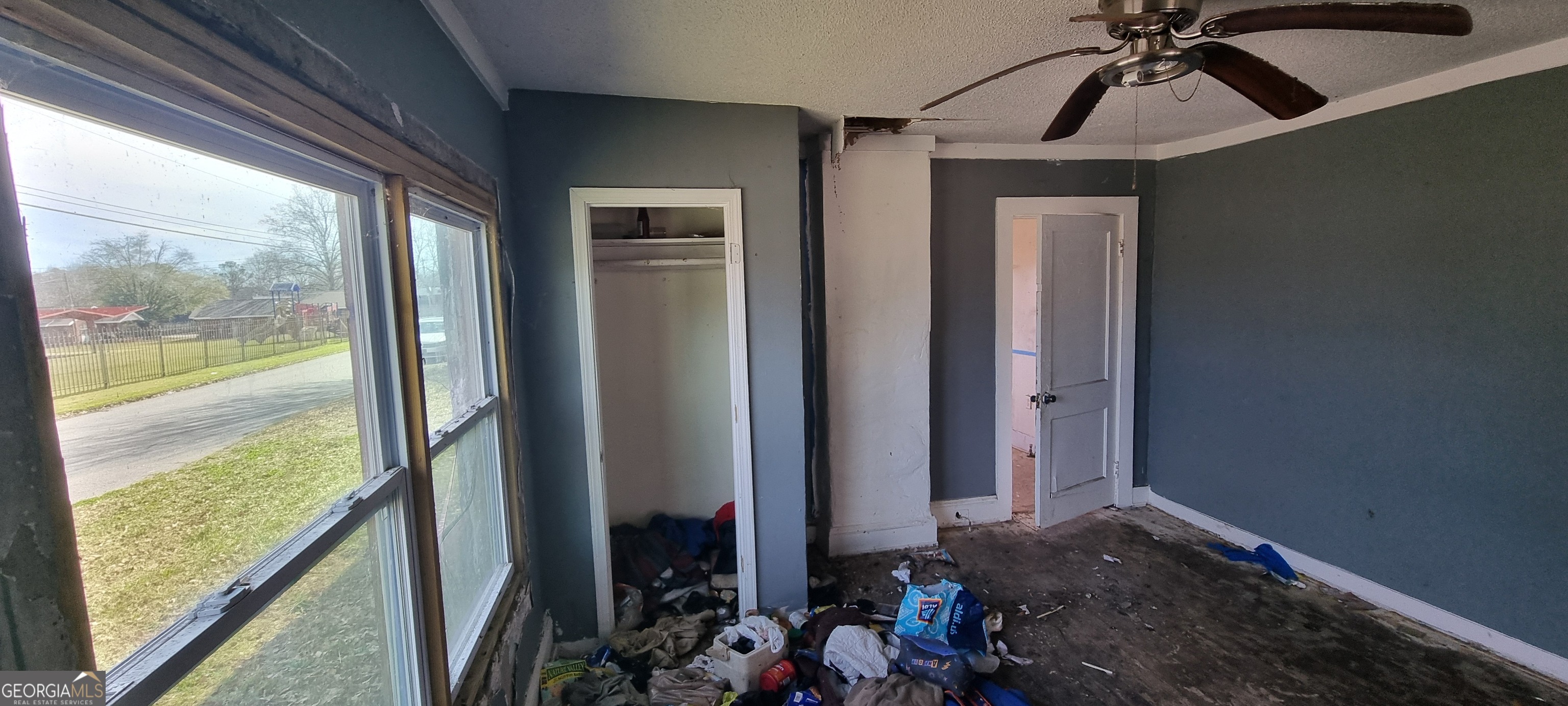 19 Landers Street Newnan, GA 30263 - Photo 21 of 40 a view of a livingroom with a ceiling fan and window