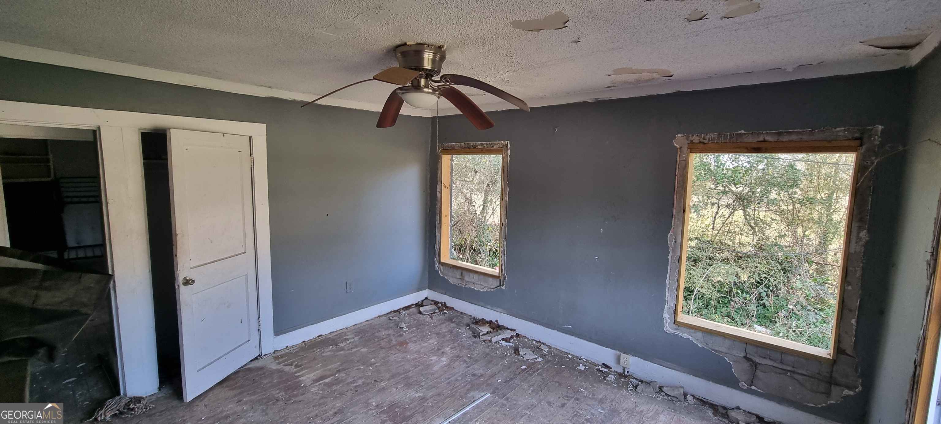 19 Landers Street Newnan, GA 30263 - Photo 24 of 40 a view of room with a ceiling fan and window