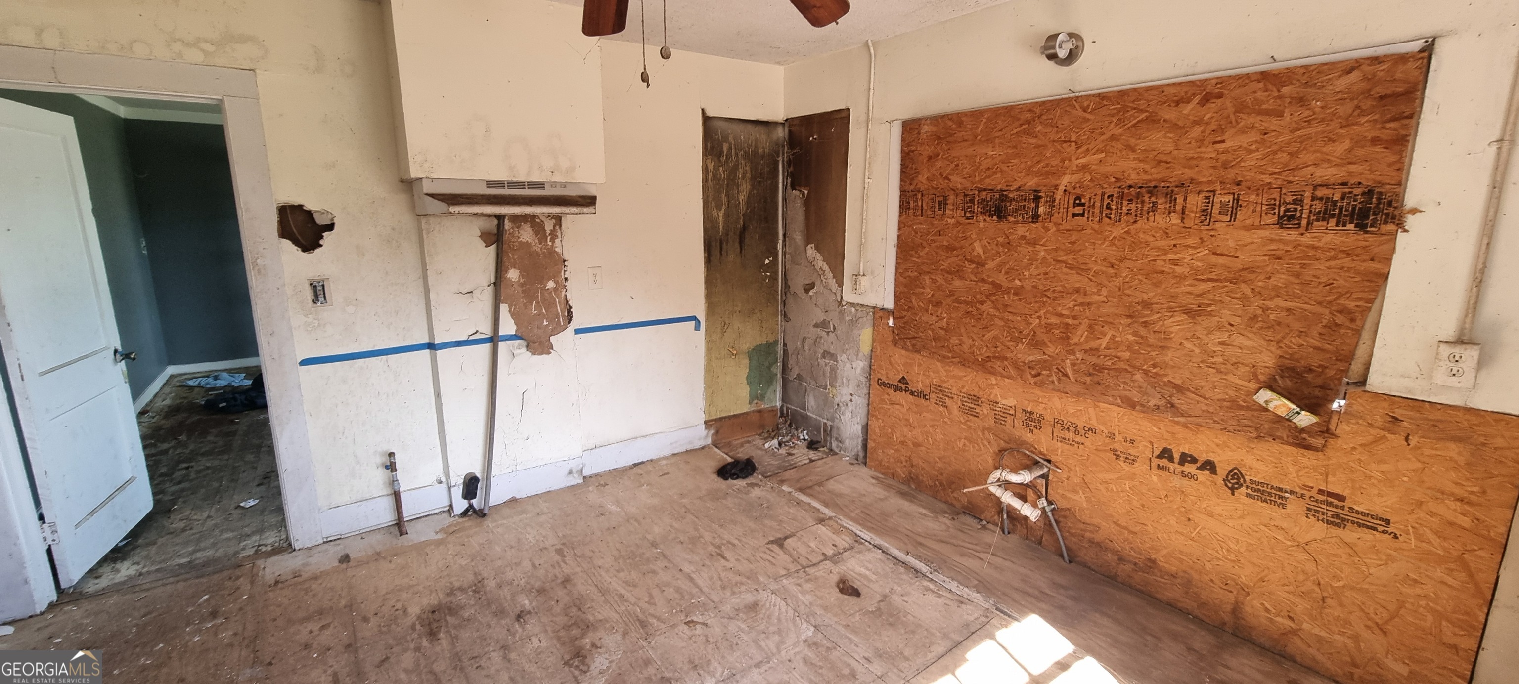 19 Landers Street Newnan, GA 30263 - Photo 35 of 40 a bathroom with a tub and a shower