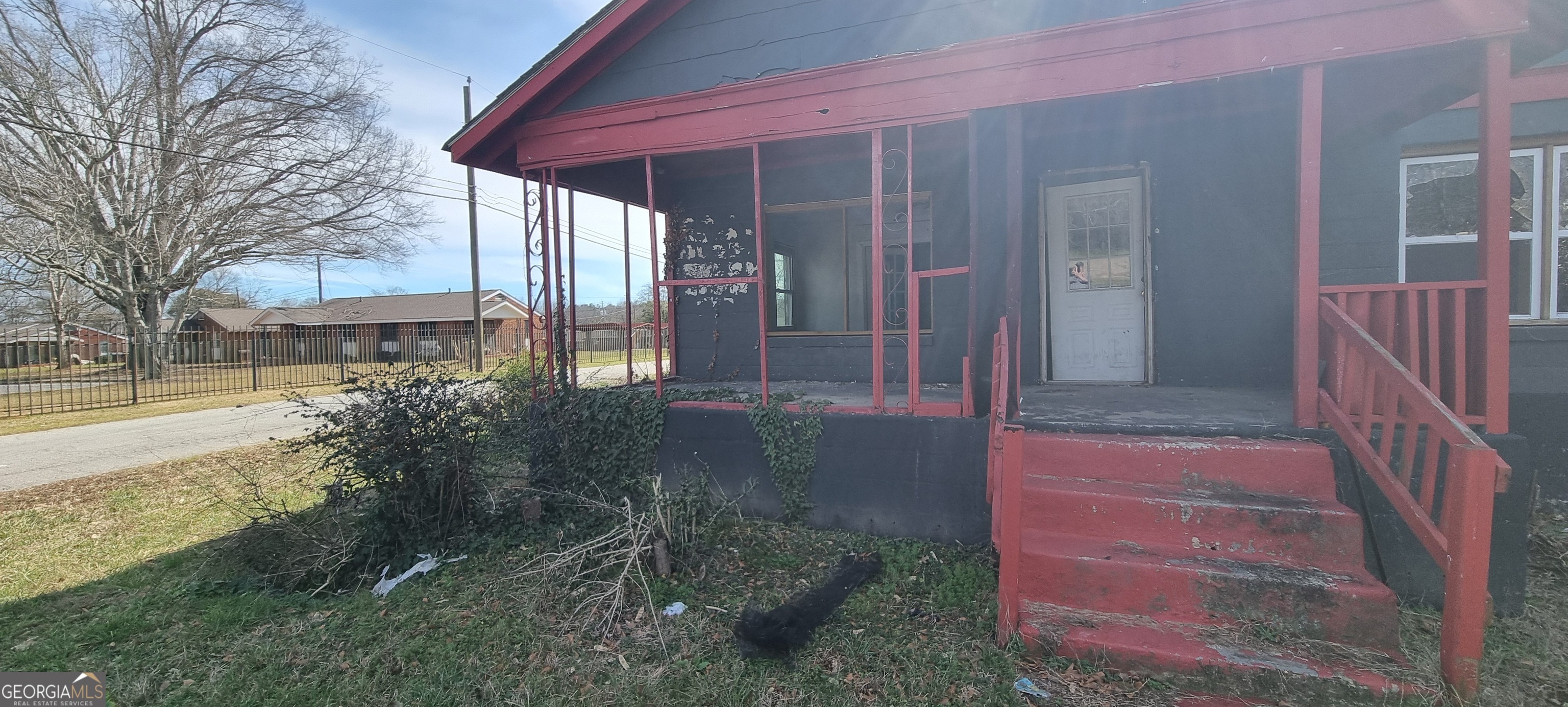 19 Landers Street Newnan, GA 30263 - Photo 4 of 40 a front view of a house with a yard