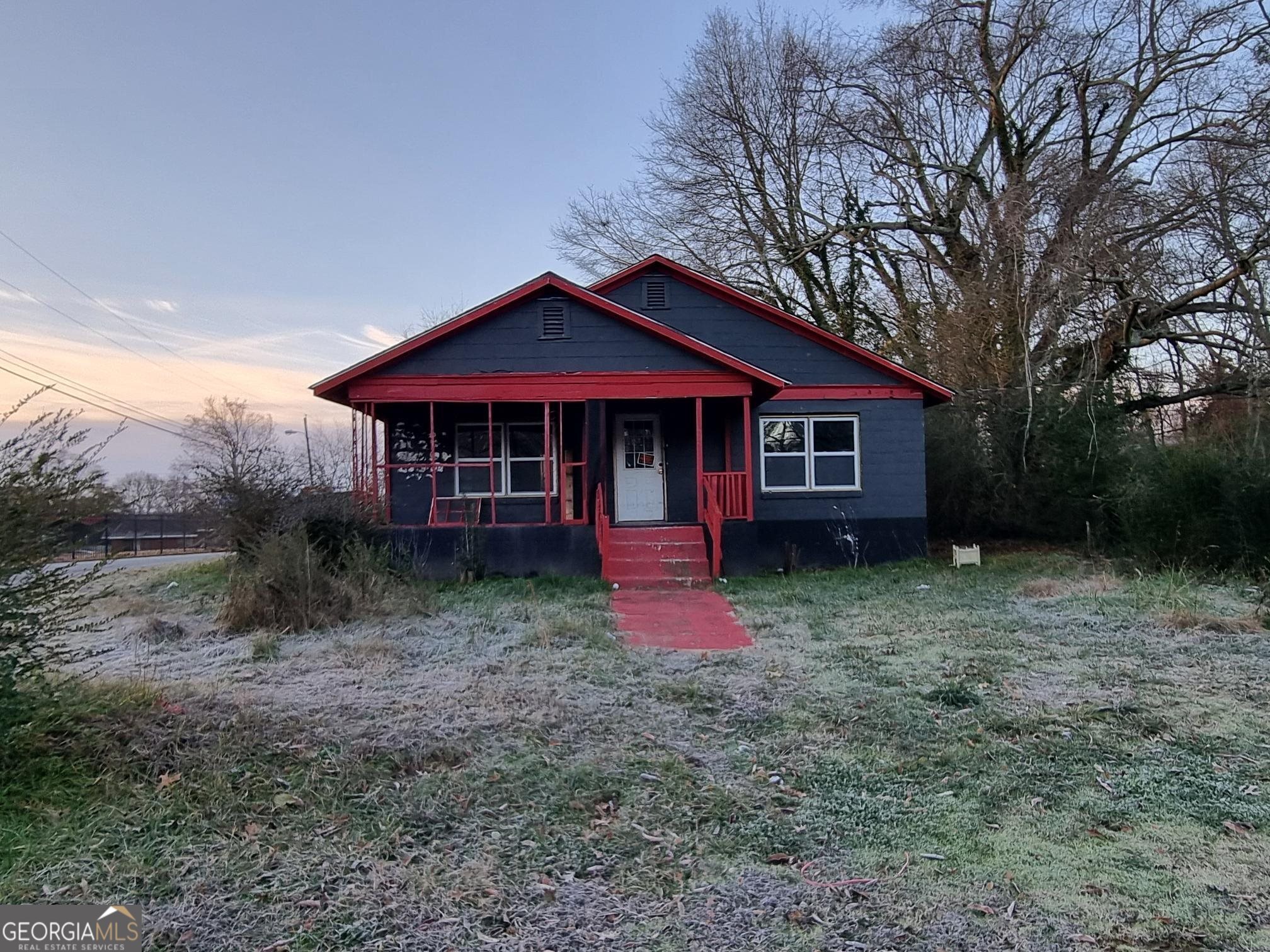 19 Landers Street Newnan, GA 30263 - Photo 5 of 40 a front view of a house with garden