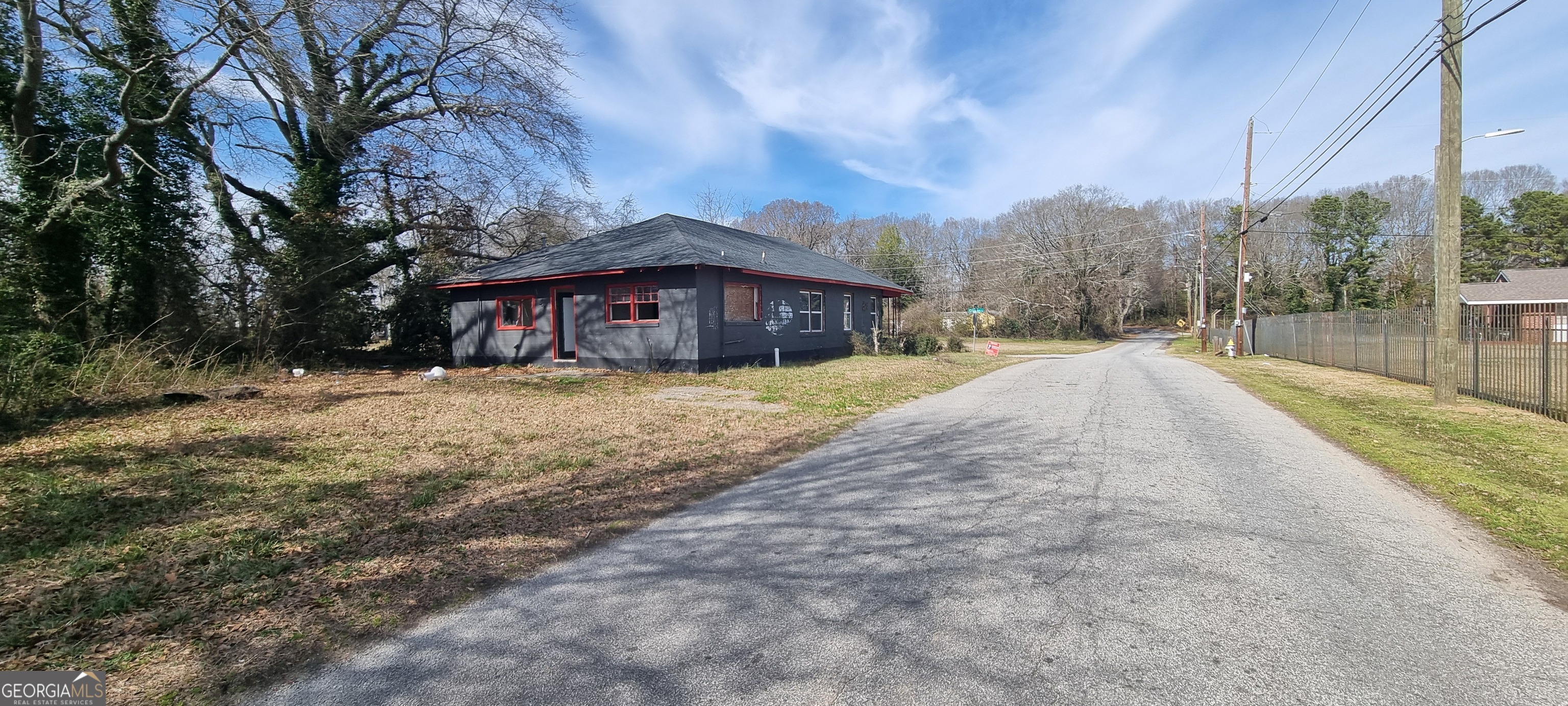 19 Landers Street Newnan, GA 30263 - Photo 7 of 40 a view of a house with a yard covered in snow