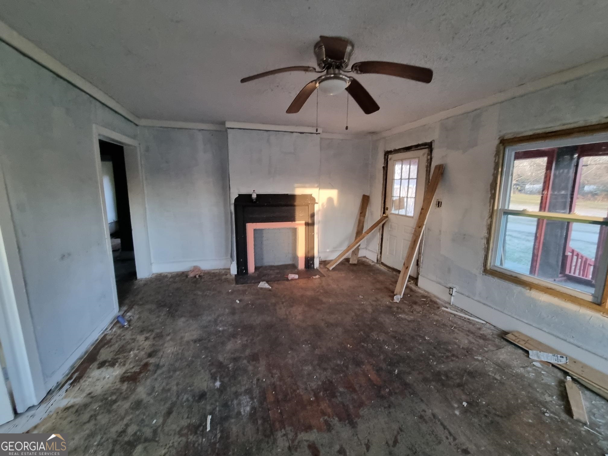 19 Landers Street Newnan, GA 30263 - Photo 8 of 40 a view of empty room with windows and ceiling fan
