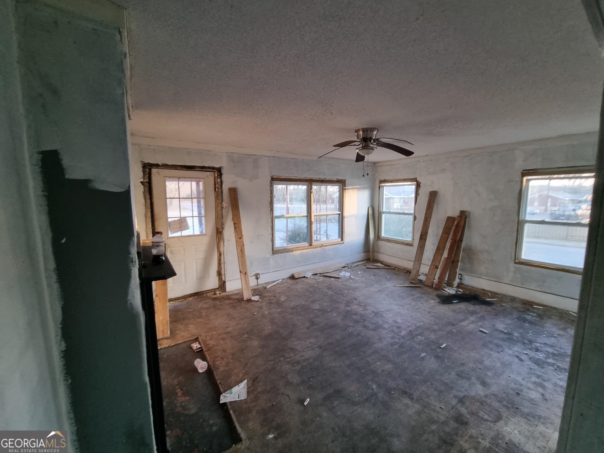 19 Landers Street Newnan, GA 30263 - Photo 9 of 40 an empty room with windows and closet