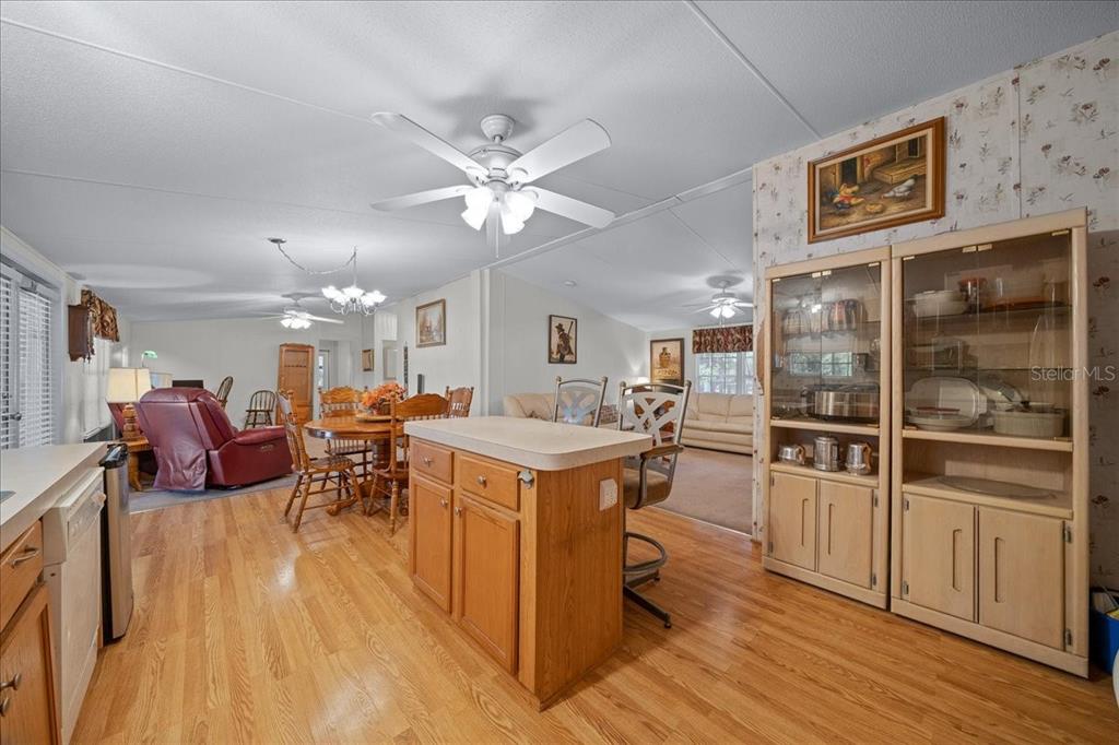 19189 Southwest 29th Street Dunnellon, FL 34432 - Photo 22 of 34 a view of a dining room with furniture window and wooden floor