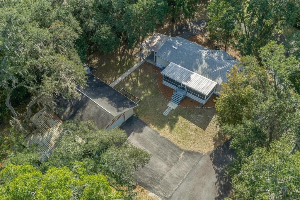 19189 Southwest 29th Street Dunnellon, FL 34432 - Photo 7 of 34 an aerial view of a house with a yard