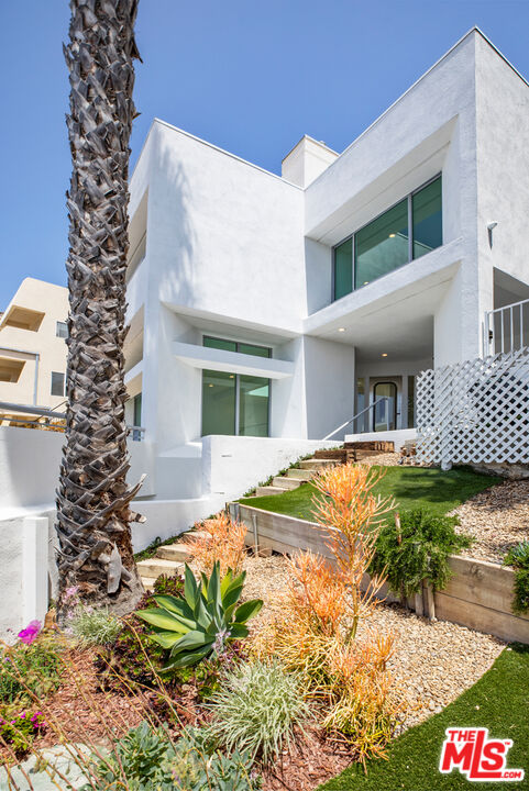 21349 Rambla Vista Malibu, CA 90265 - Photo 2 of 16 a house view with a outdoor space