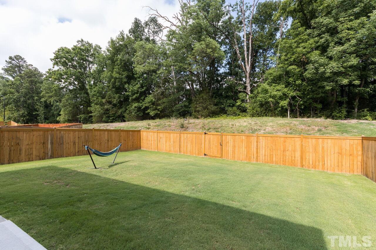 1109 Sandtrap Way Durham, NC 27703 - Photo 24 of 35 a view of swimming pool with a yard