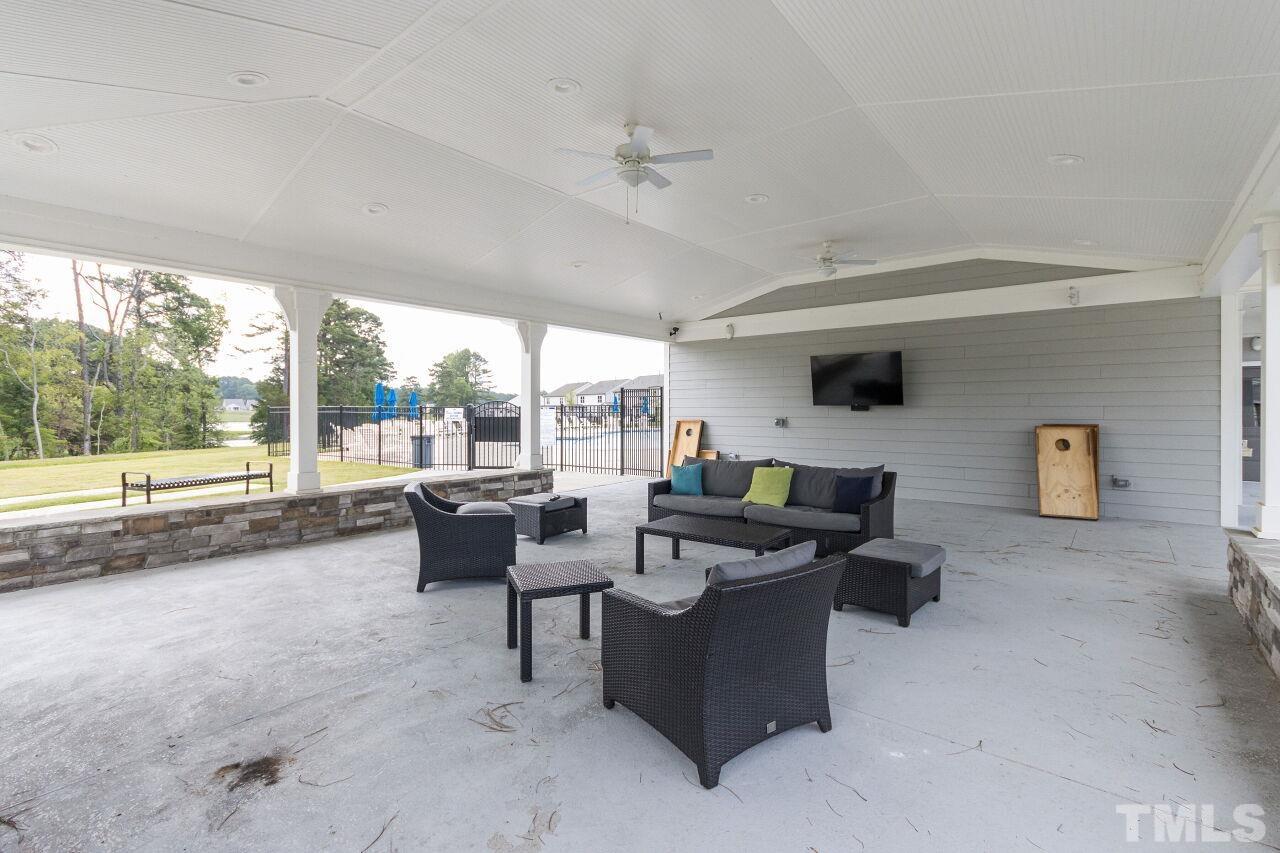 1109 Sandtrap Way Durham, NC 27703 - Photo 30 of 35 a living room with furniture and a large window