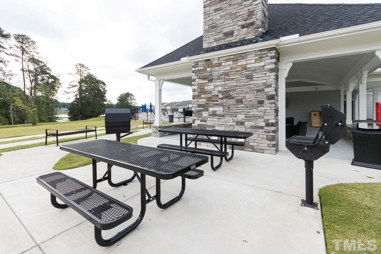 1109 Sandtrap Way Durham, NC 27703 - Photo 31 of 35 a view of a terrace with furniture and a potted plant