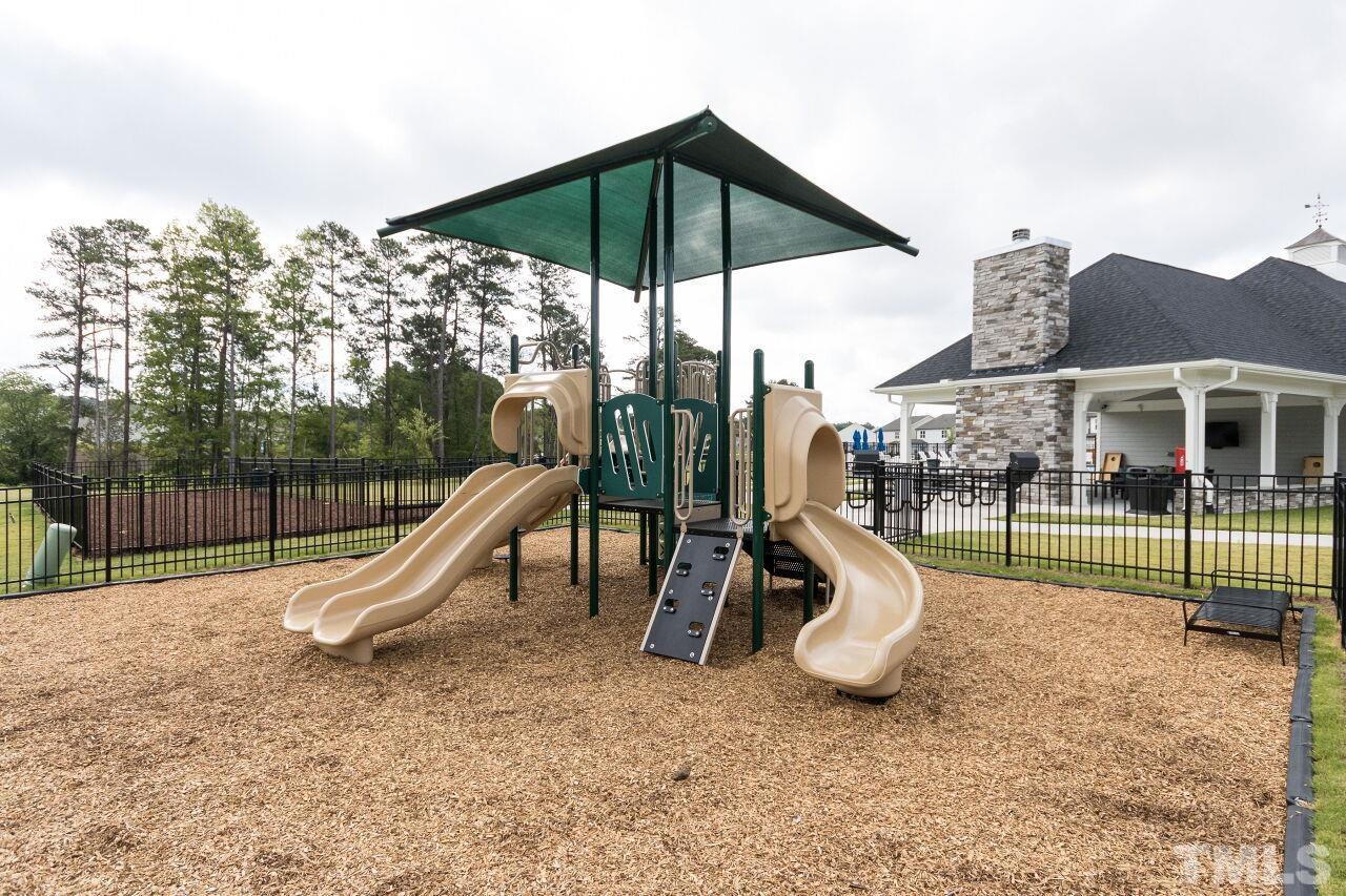 1109 Sandtrap Way Durham, NC 27703 - Photo 32 of 35 a view of a park with a slide