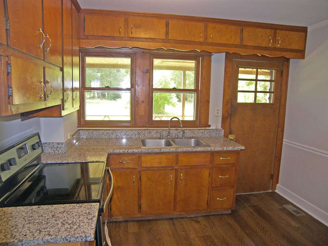 1112 Thompson Road Durham, NC 27704 - Photo 9 of 17 Kitchen to covered porch