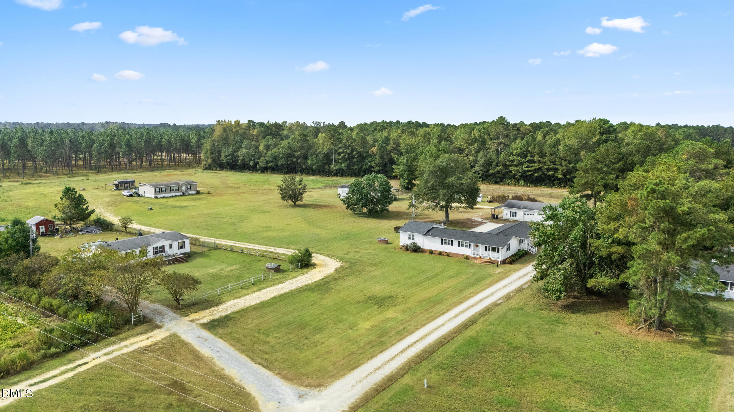 8056 Concord Church Road Autryville, NC 28318 - Photo 1 of 48 a view of a swimming pool and a yard