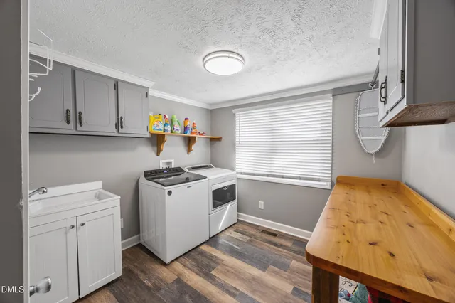 a kitchen with a stove and a sink