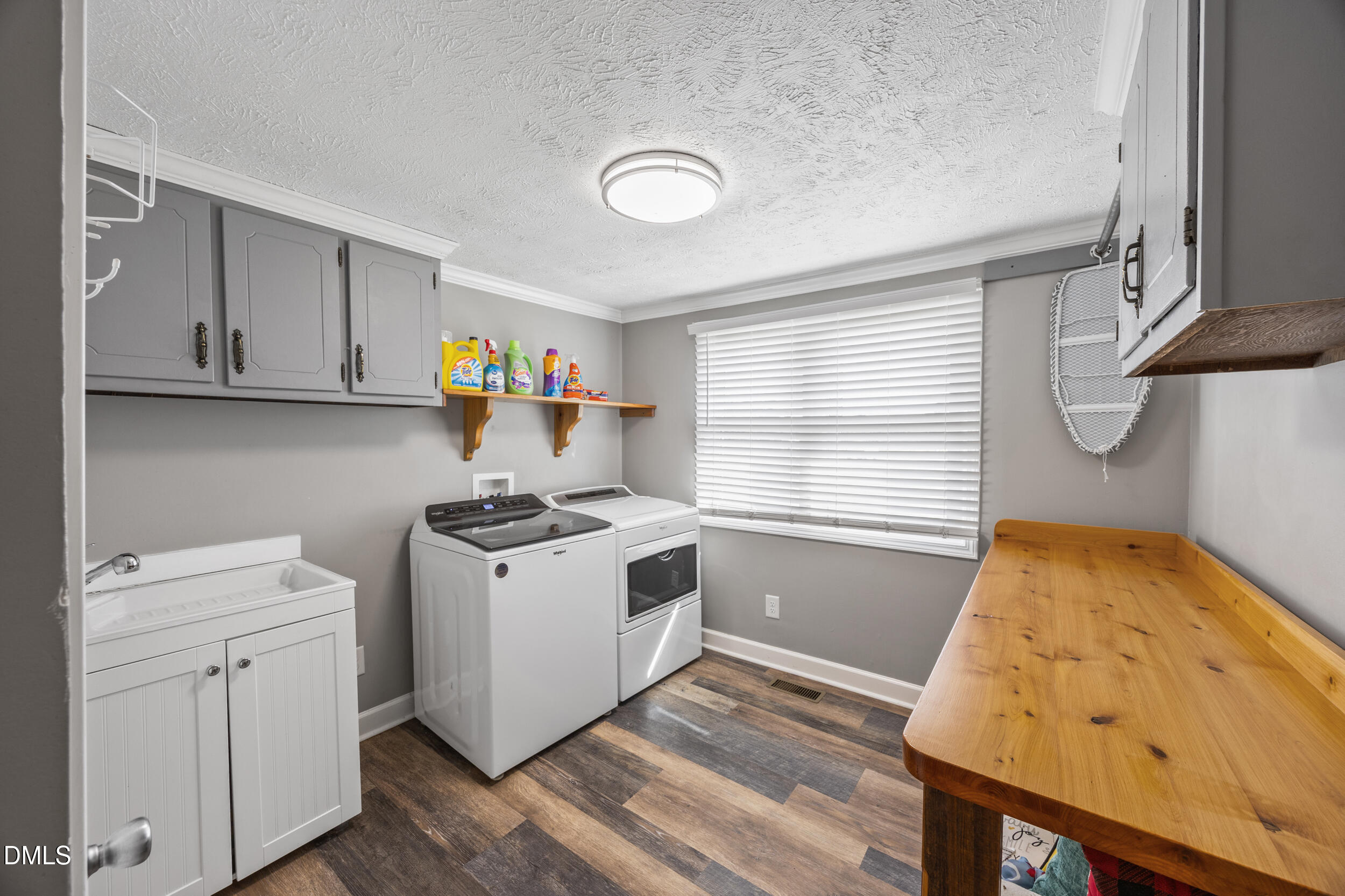 8056 Concord Church Road Autryville, NC 28318 - Photo 15 of 48 a kitchen with a stove and a sink