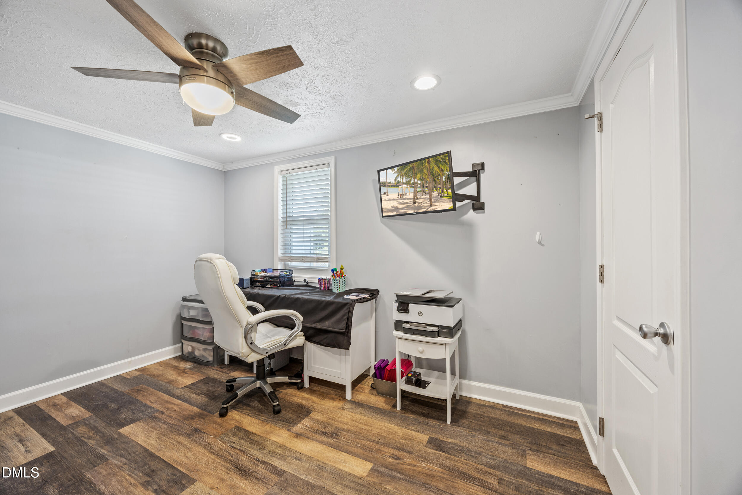 8056 Concord Church Road Autryville, NC 28318 - Photo 20 of 48 a view of a workspace with furniture and a window