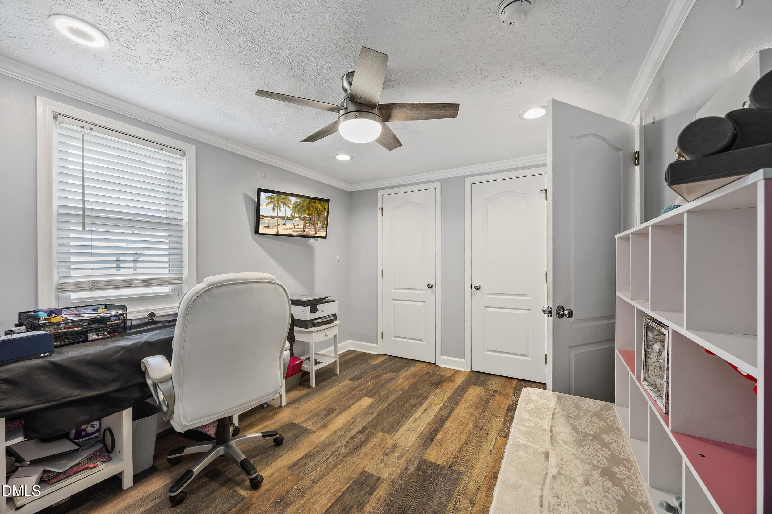 8056 Concord Church Road Autryville, NC 28318 - Photo 21 of 48 a room with wooden floor and windows