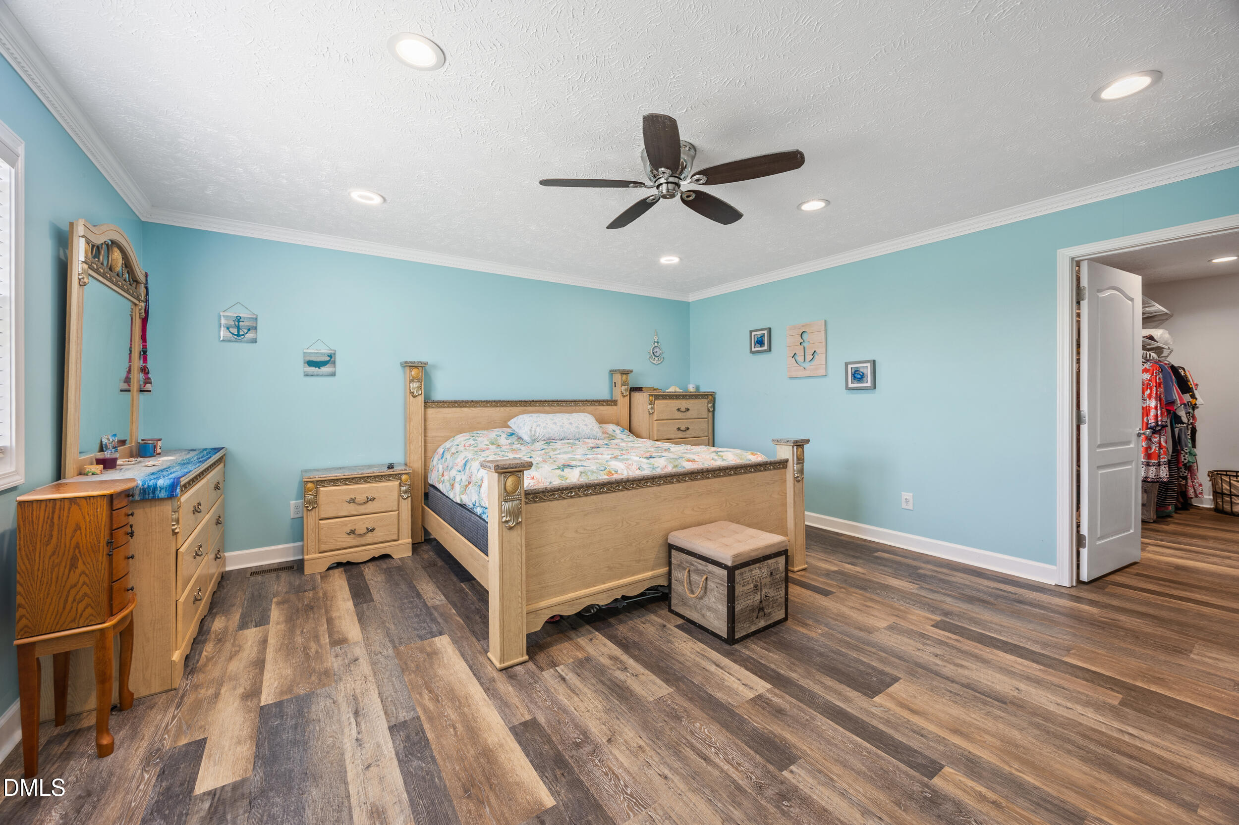 8056 Concord Church Road Autryville, NC 28318 - Photo 23 of 48 a room with a bed and furniture