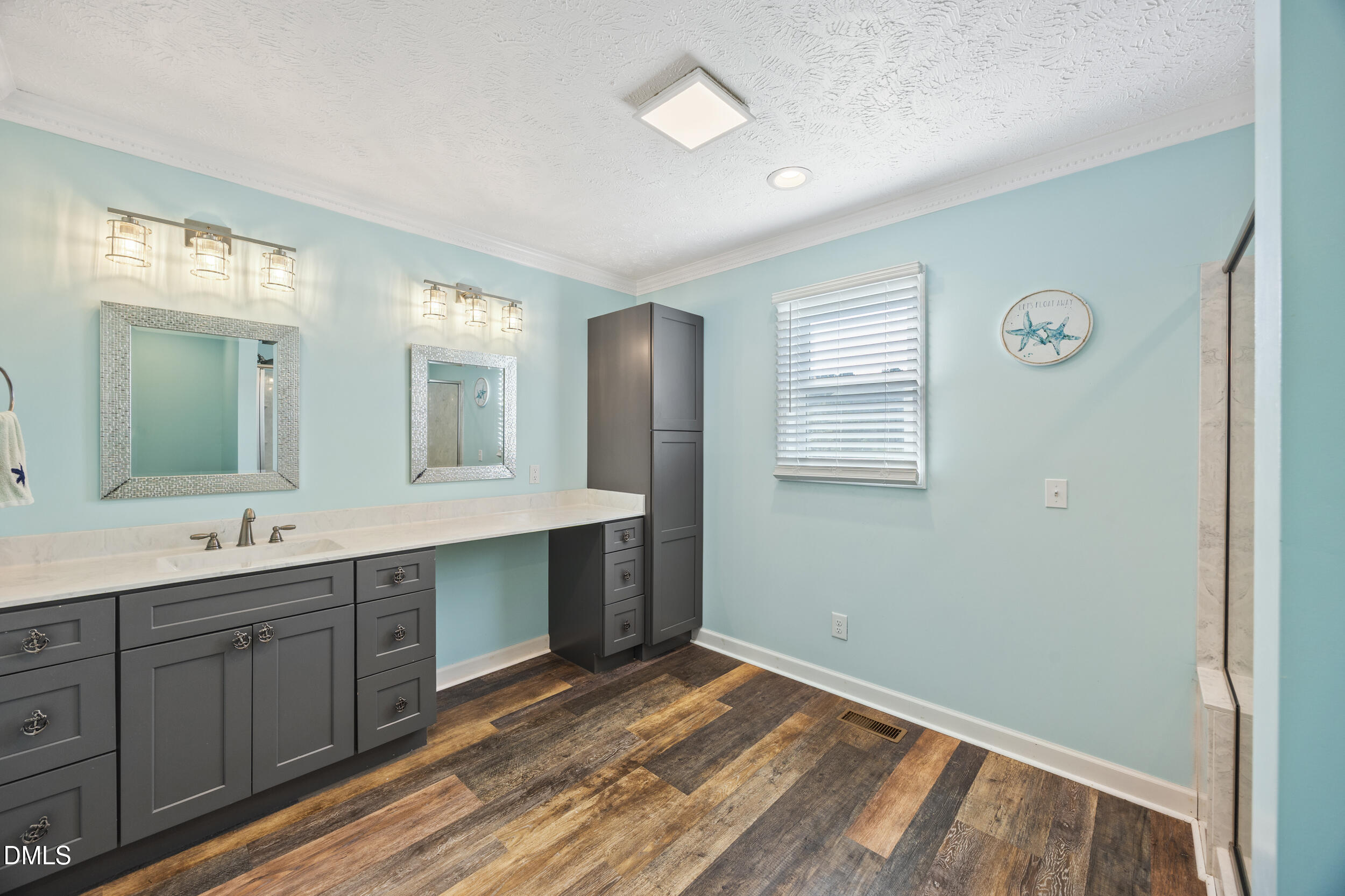 8056 Concord Church Road Autryville, NC 28318 - Photo 26 of 48 a spacious bathroom with a double vanity sink and a mirror
