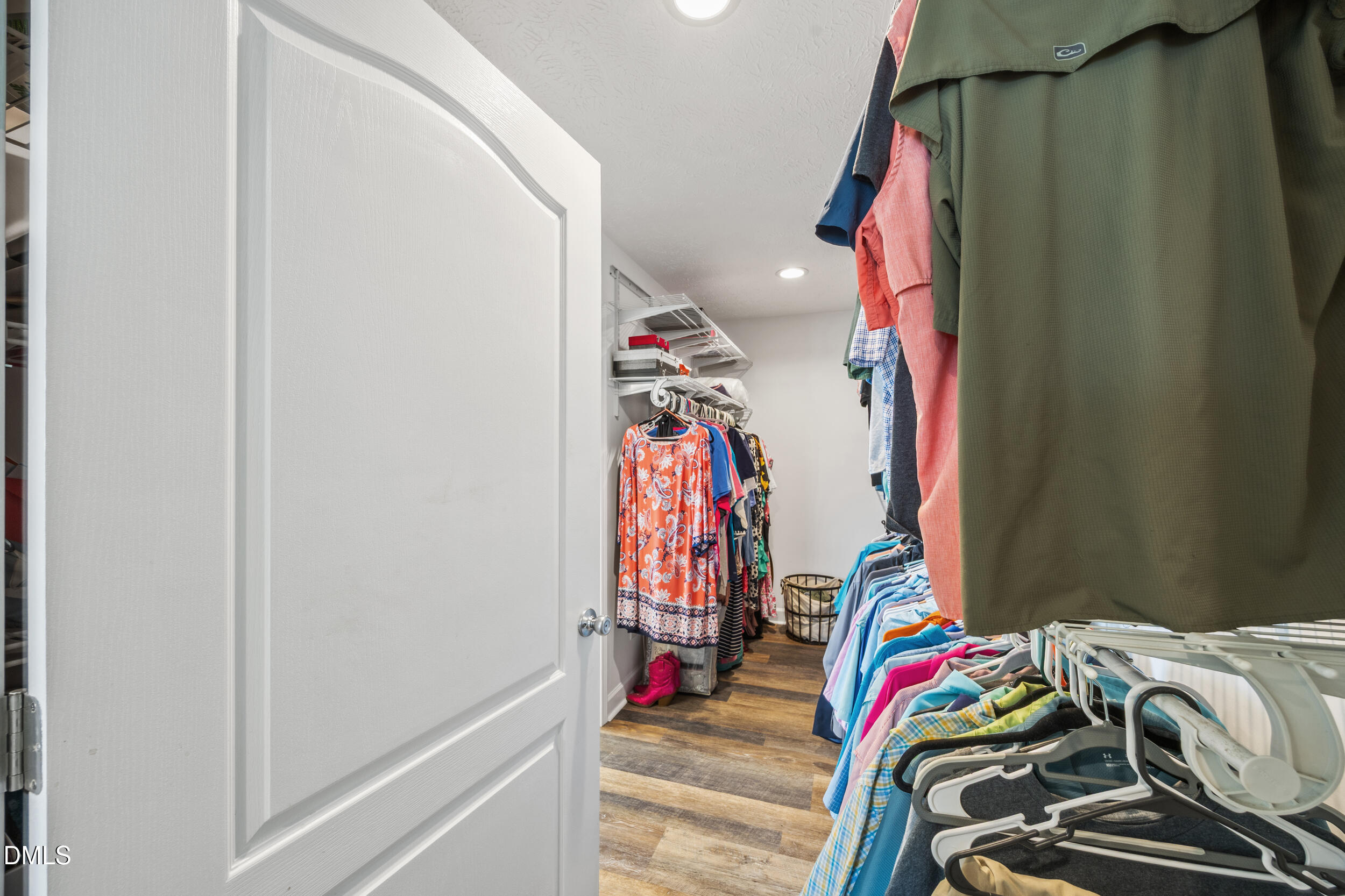 8056 Concord Church Road Autryville, NC 28318 - Photo 28 of 48 a view of walk in closet with clothes