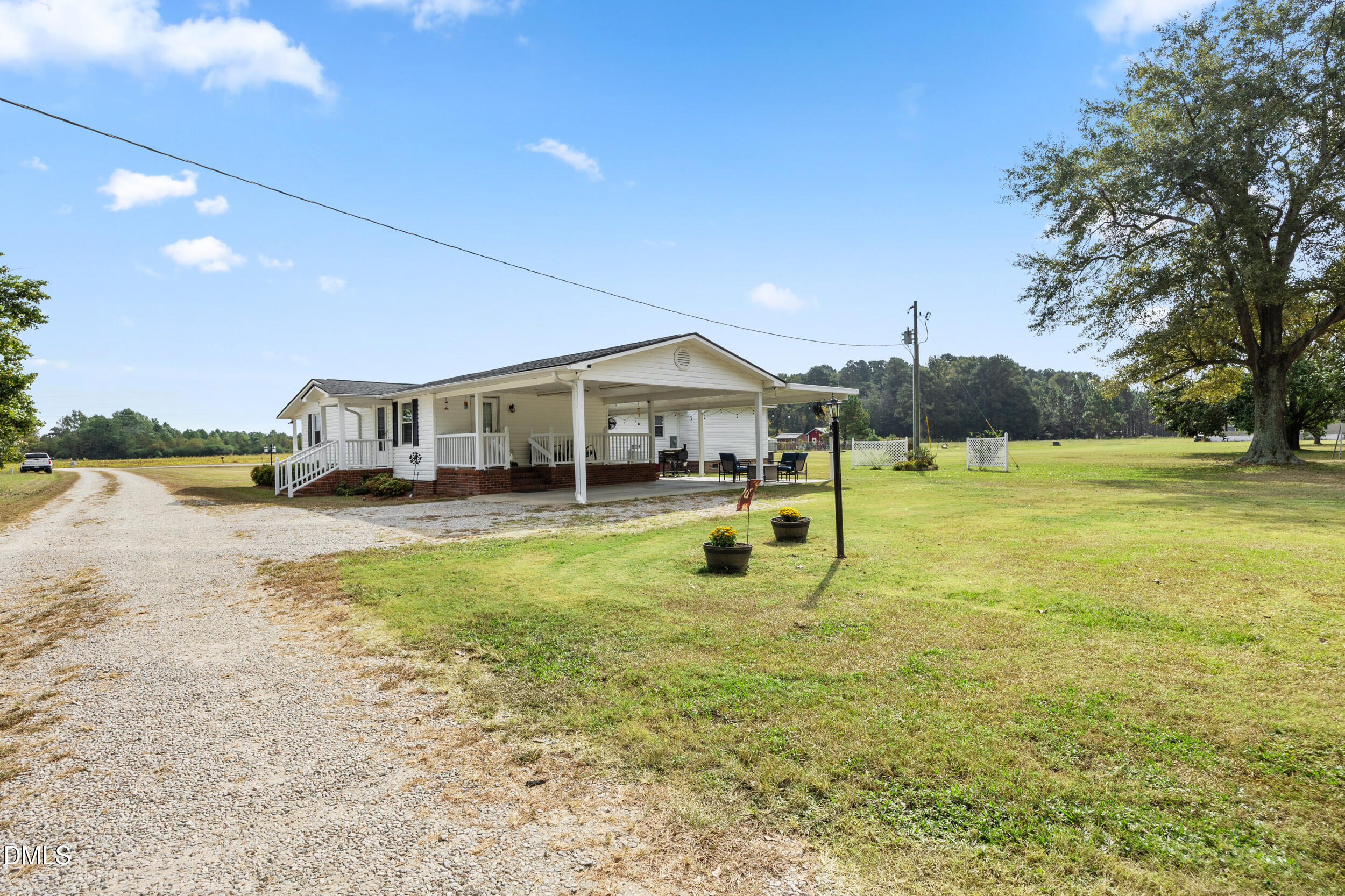 8056 Concord Church Road Autryville, NC 28318 - Photo 30 of 48 a swimming pool with outdoor seating and yard