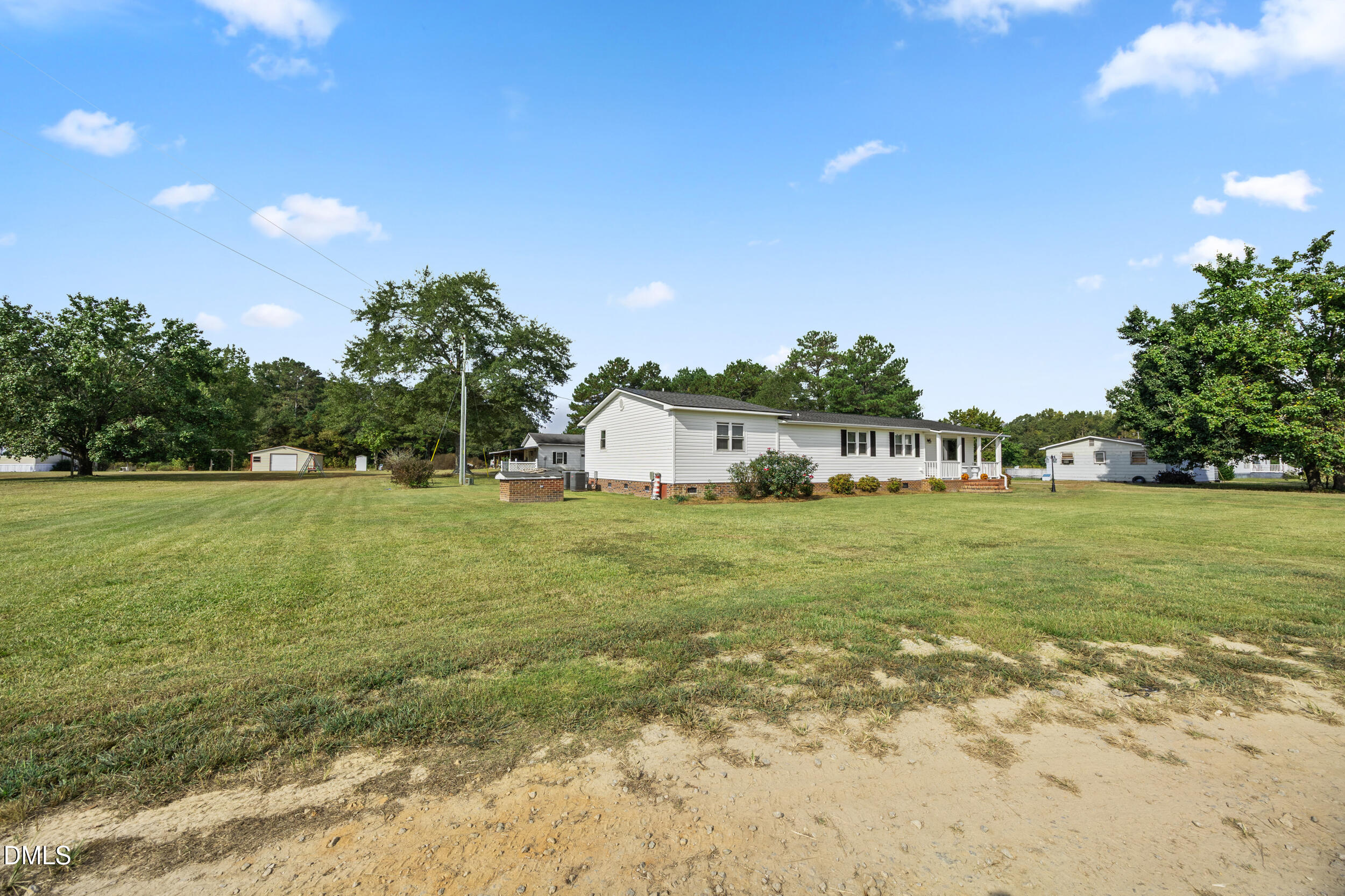 8056 Concord Church Road Autryville, NC 28318 - Photo 34 of 48 a view of a house with a big yard