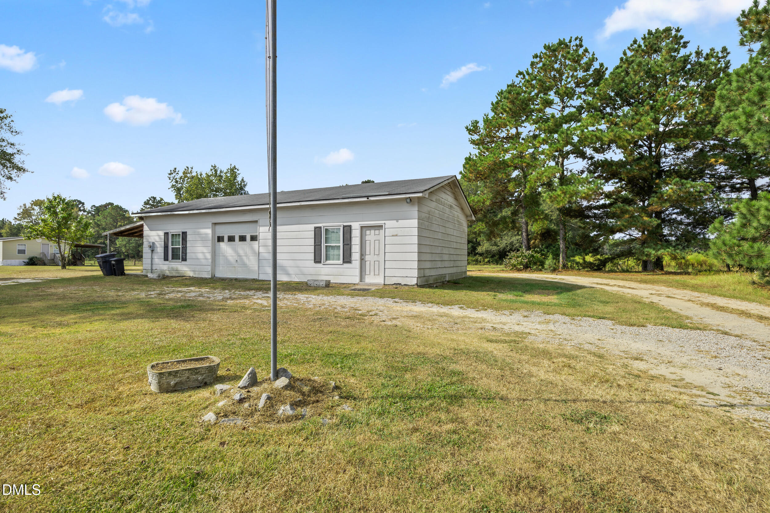8056 Concord Church Road Autryville, NC 28318 - Photo 35 of 48 a view of a house with swimming pool