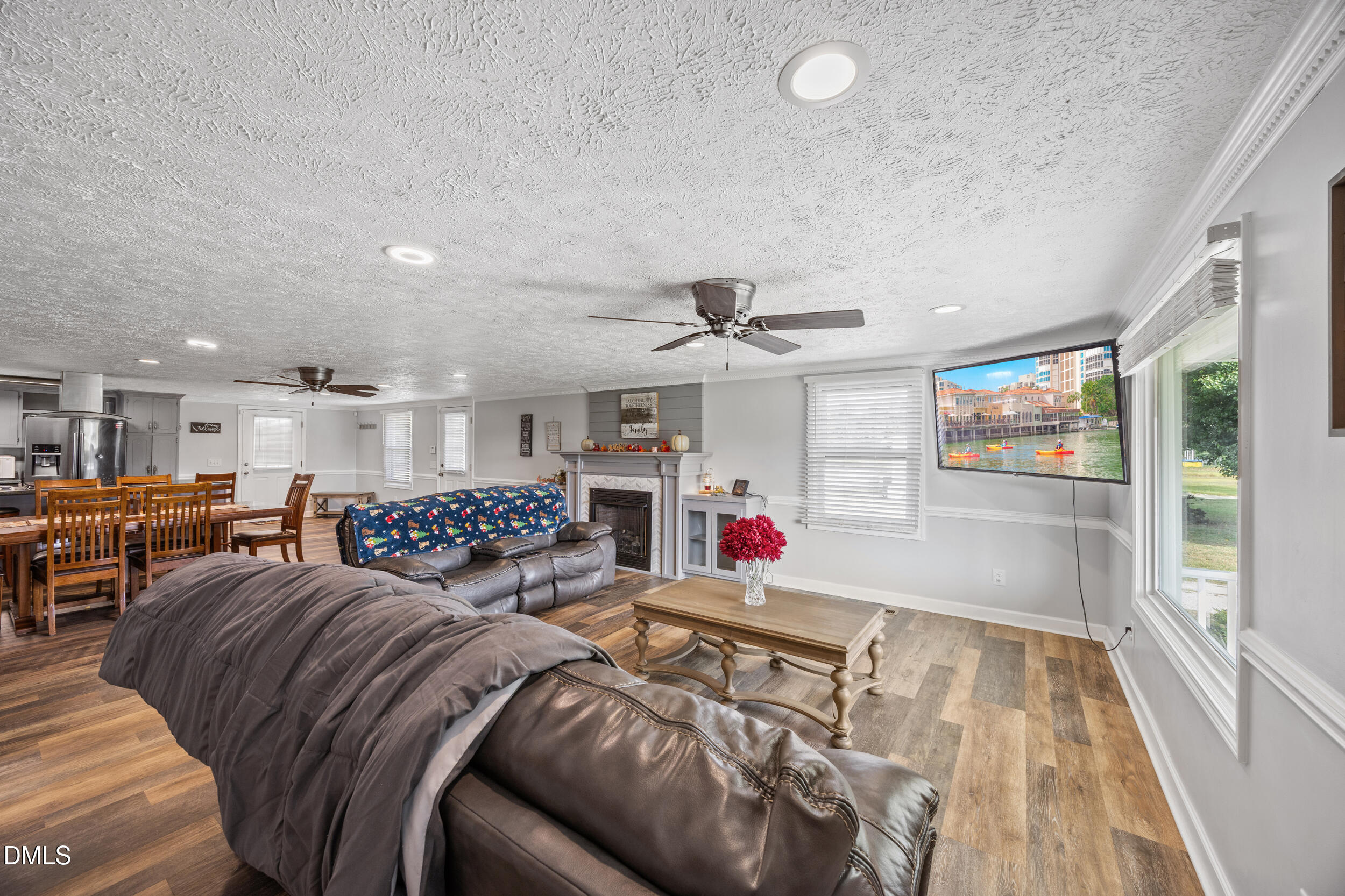 8056 Concord Church Road Autryville, NC 28318 - Photo 4 of 48 a bedroom with furniture and a large window