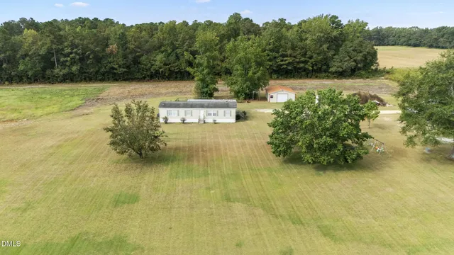 a view of a lake with a yard