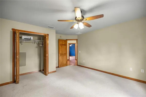 an empty room with a empty space and window