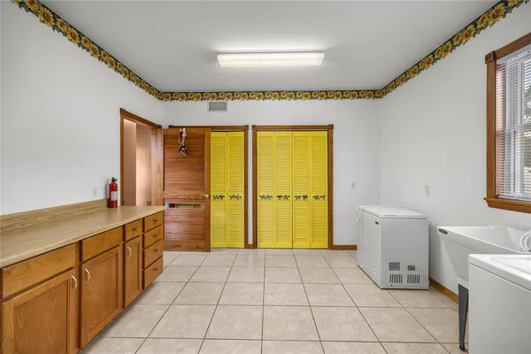 an aerial view of a house with outdoor space