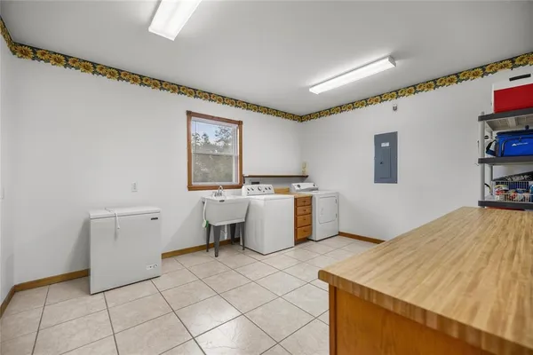 a view of a house with outdoor seating