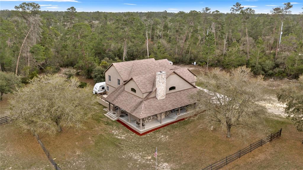 4559 West Dunklin Street Dunnellon, FL 34433 - Photo 39 of 65 a view of a house with a mountain in the background