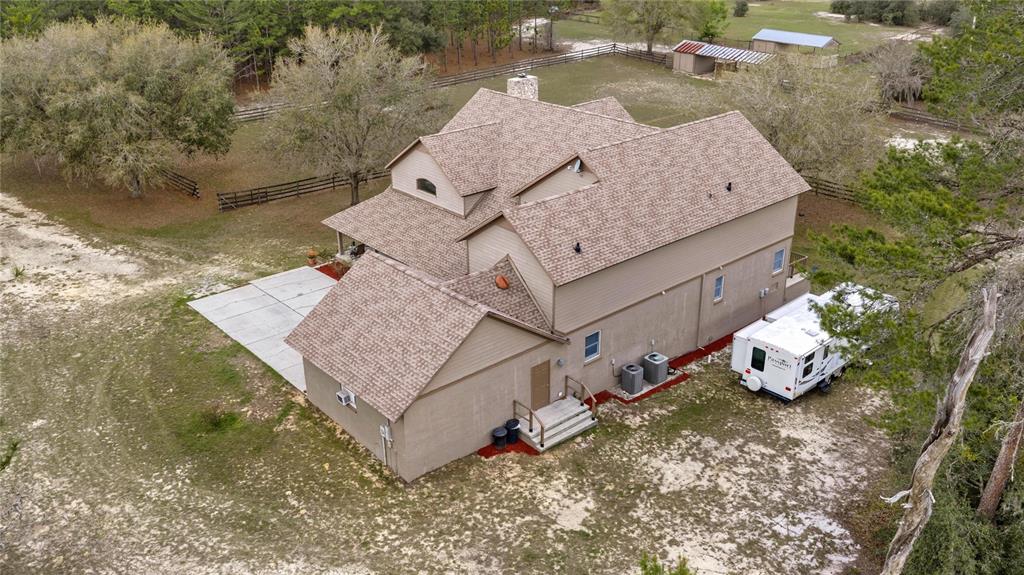 4559 West Dunklin Street Dunnellon, FL 34433 - Photo 42 of 65 an aerial view of a house with outdoor space