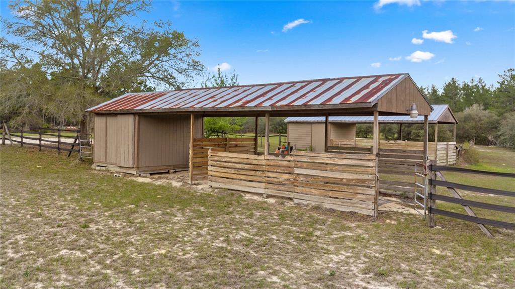 4559 West Dunklin Street Dunnellon, FL 34433 - Photo 50 of 65 a front view of a house with a garden