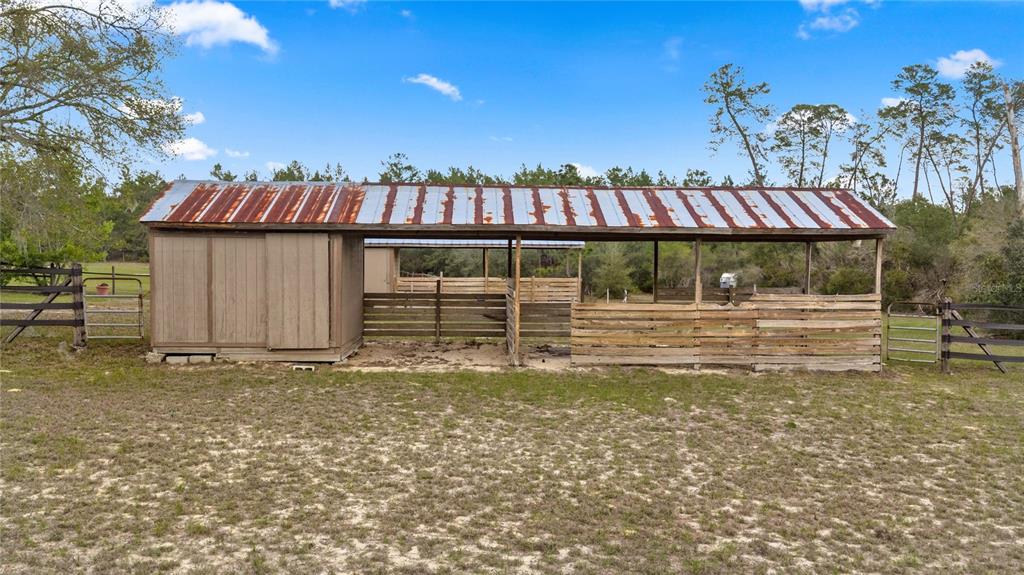 4559 West Dunklin Street Dunnellon, FL 34433 - Photo 51 of 65 a view of a house with a yard