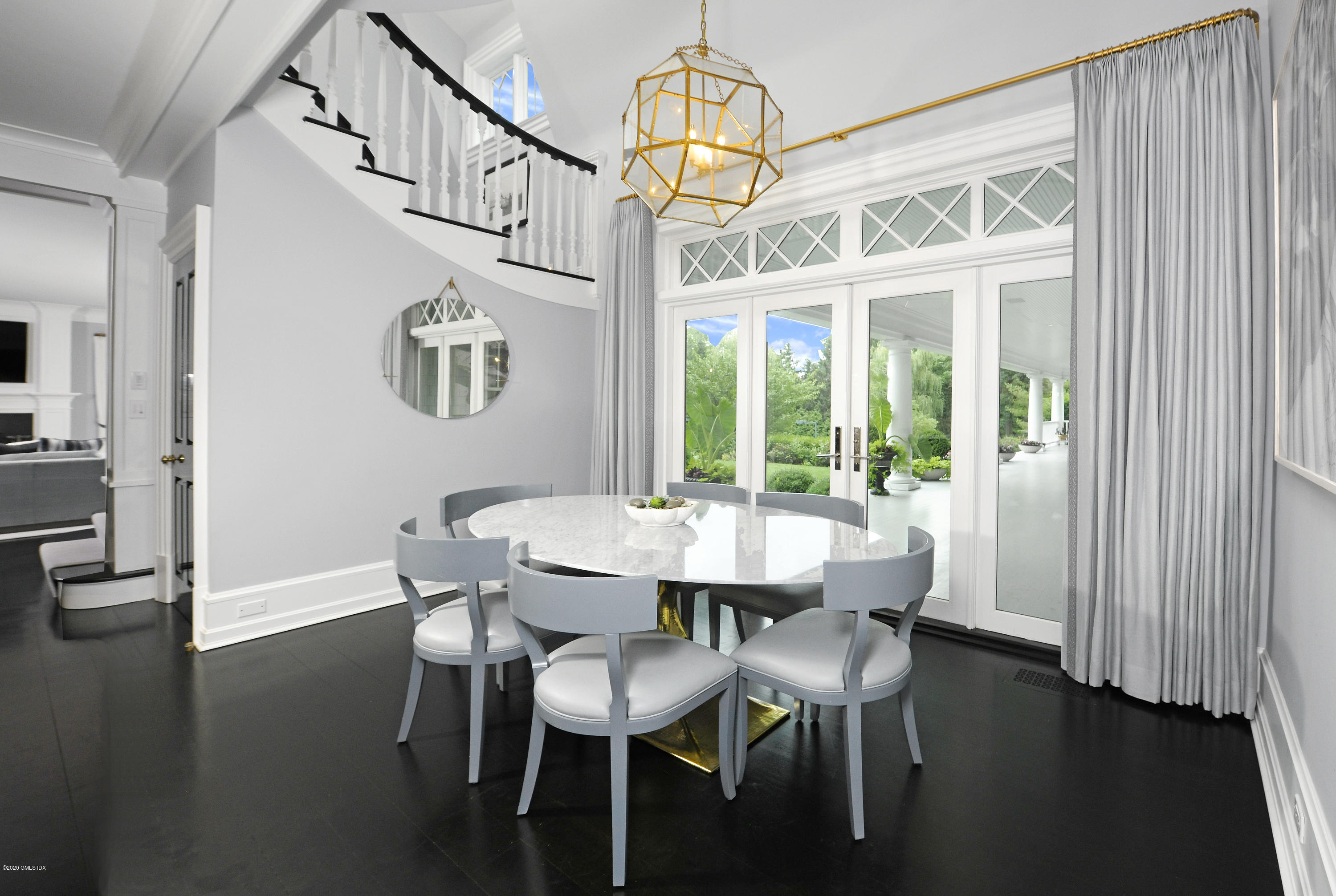 31 Rock Ridge Avenue Greenwich, CT 06831 - Photo 13 of 44 a view of a dining room with furniture window and wooden floor