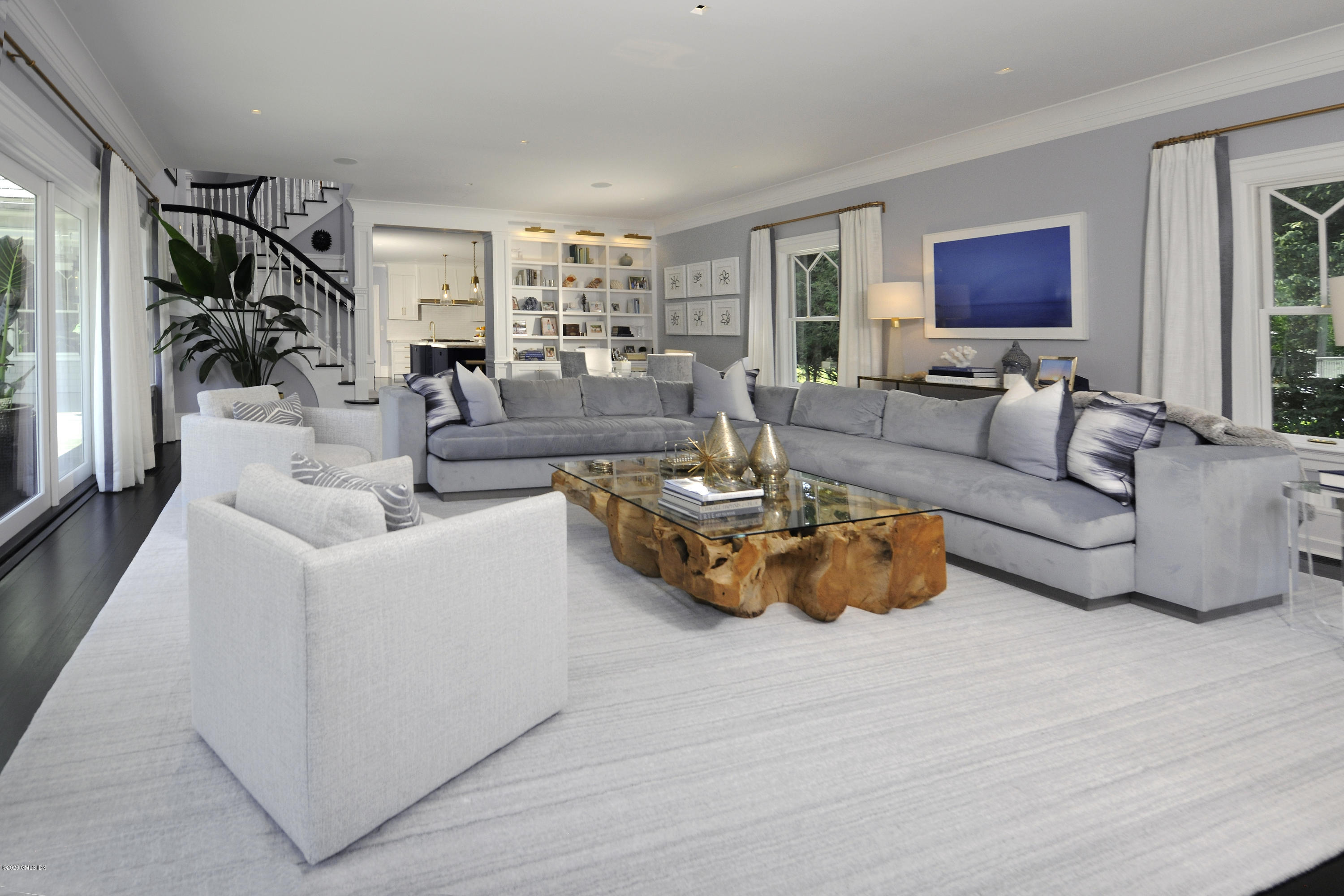 31 Rock Ridge Avenue Greenwich, CT 06831 - Photo 15 of 44 a living room with furniture and a flat screen tv