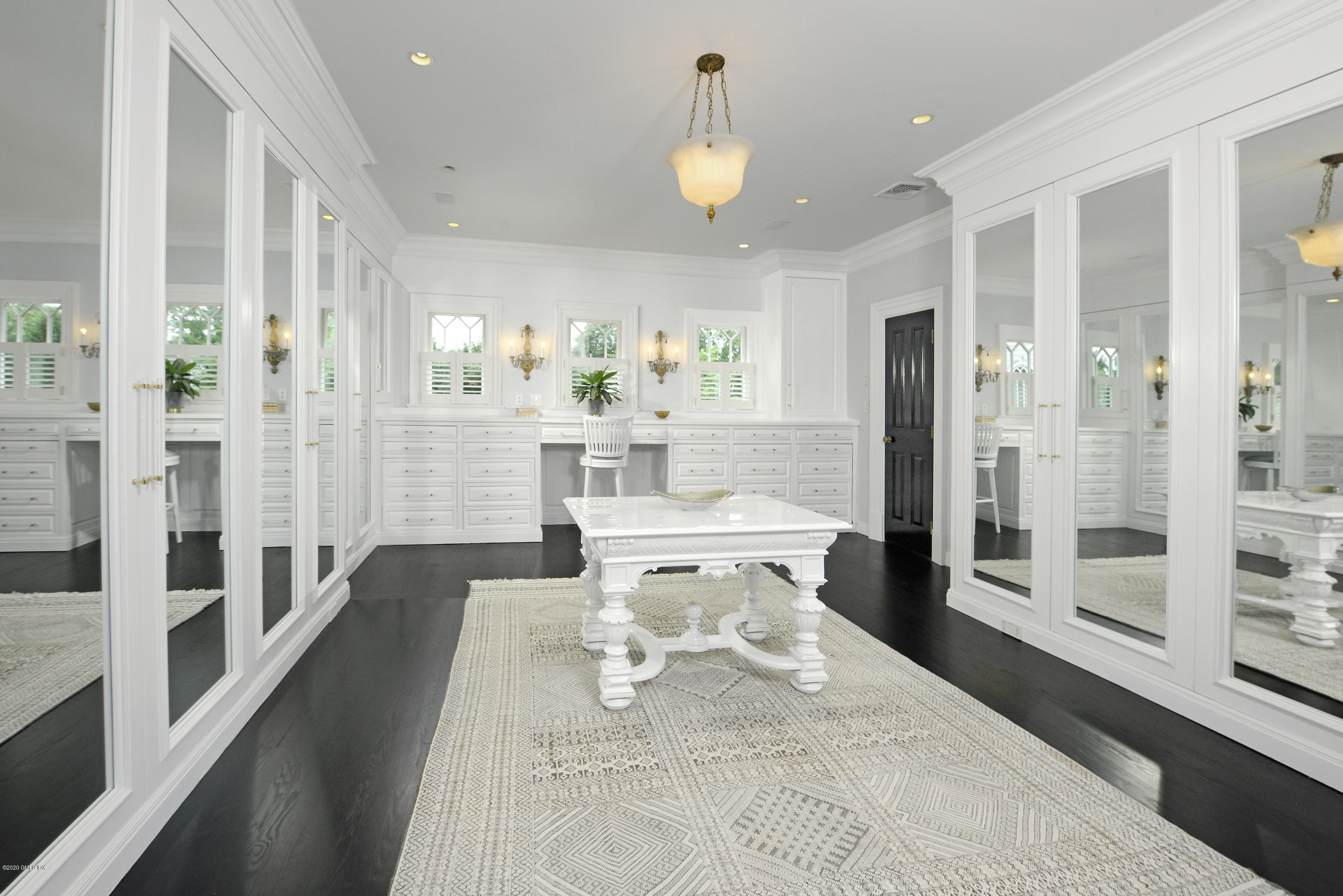 31 Rock Ridge Avenue Greenwich, CT 06831 - Photo 22 of 44 view of a dining room with furniture a chandelier and wooden floor