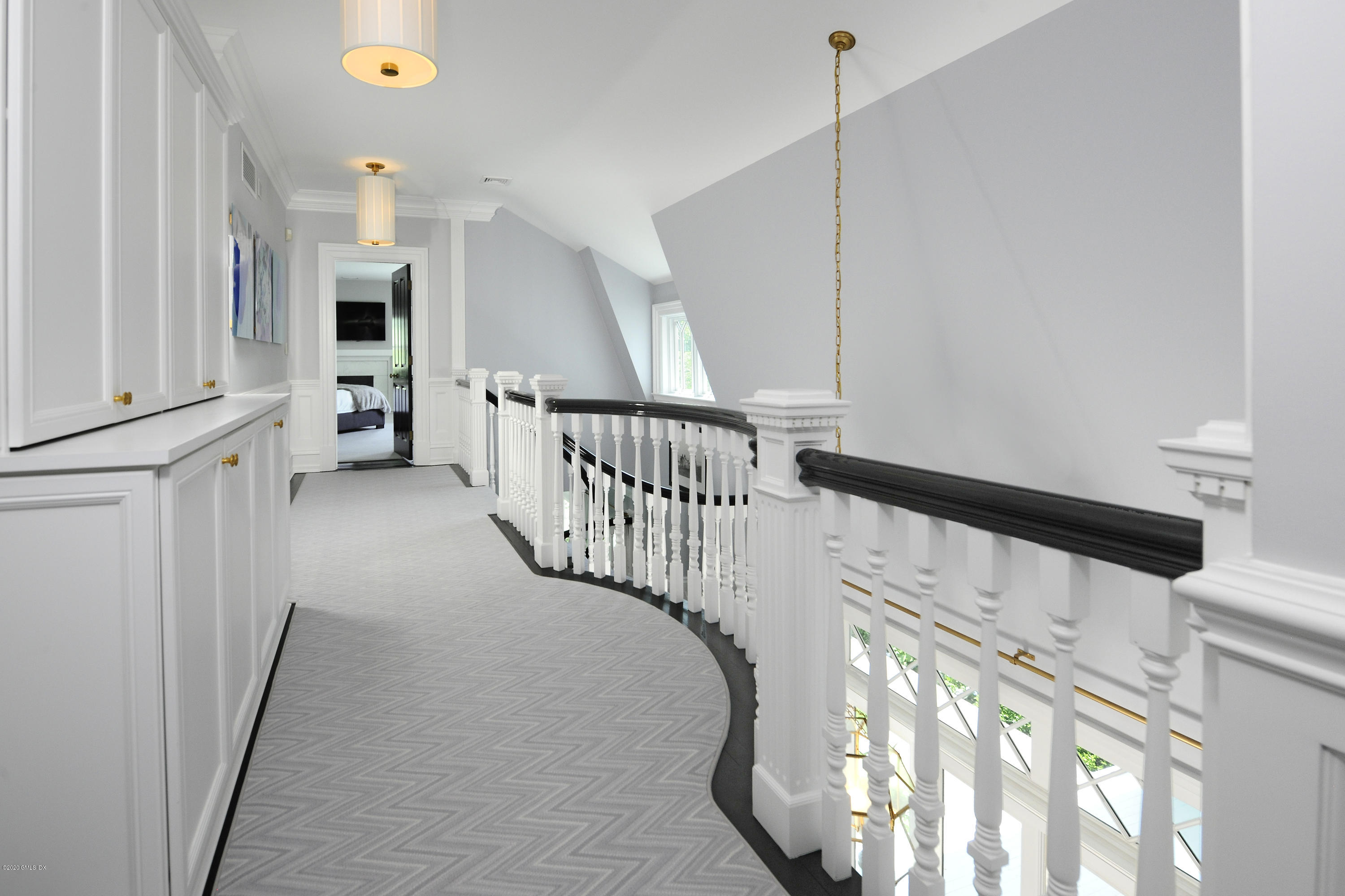 31 Rock Ridge Avenue Greenwich, CT 06831 - Photo 29 of 44 a view of a hallway with staircase