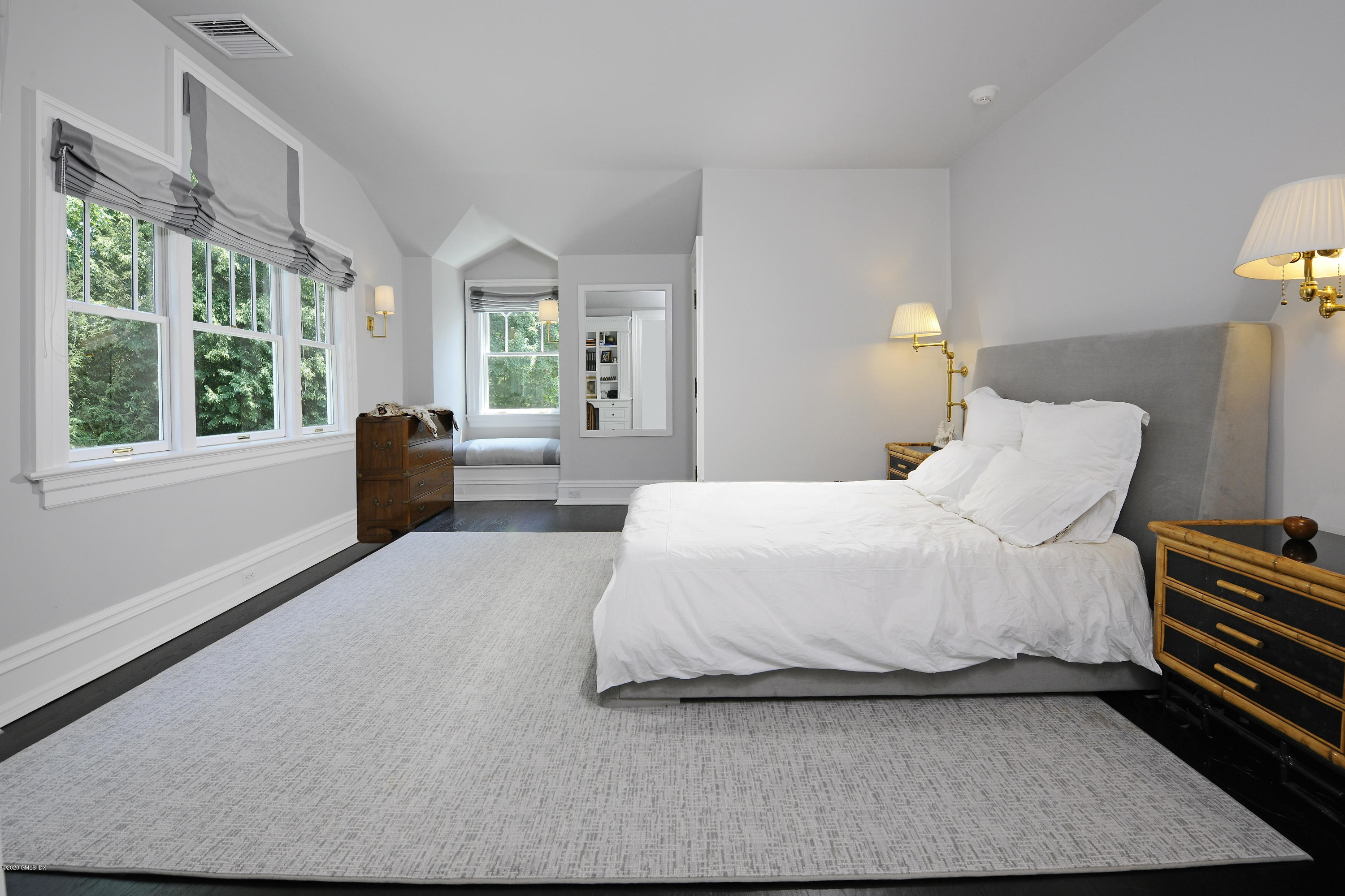 31 Rock Ridge Avenue Greenwich, CT 06831 - Photo 30 of 44 a bed room with a bed and a large window